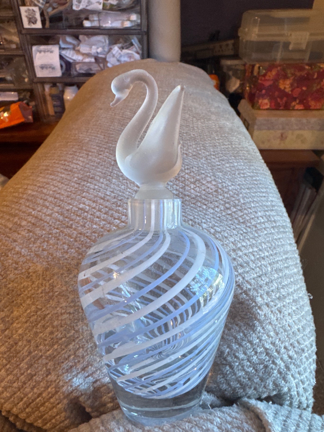 Vintage bottle with swan stopper