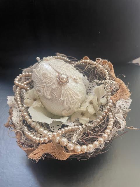 Unique nest with pearl embellishments.