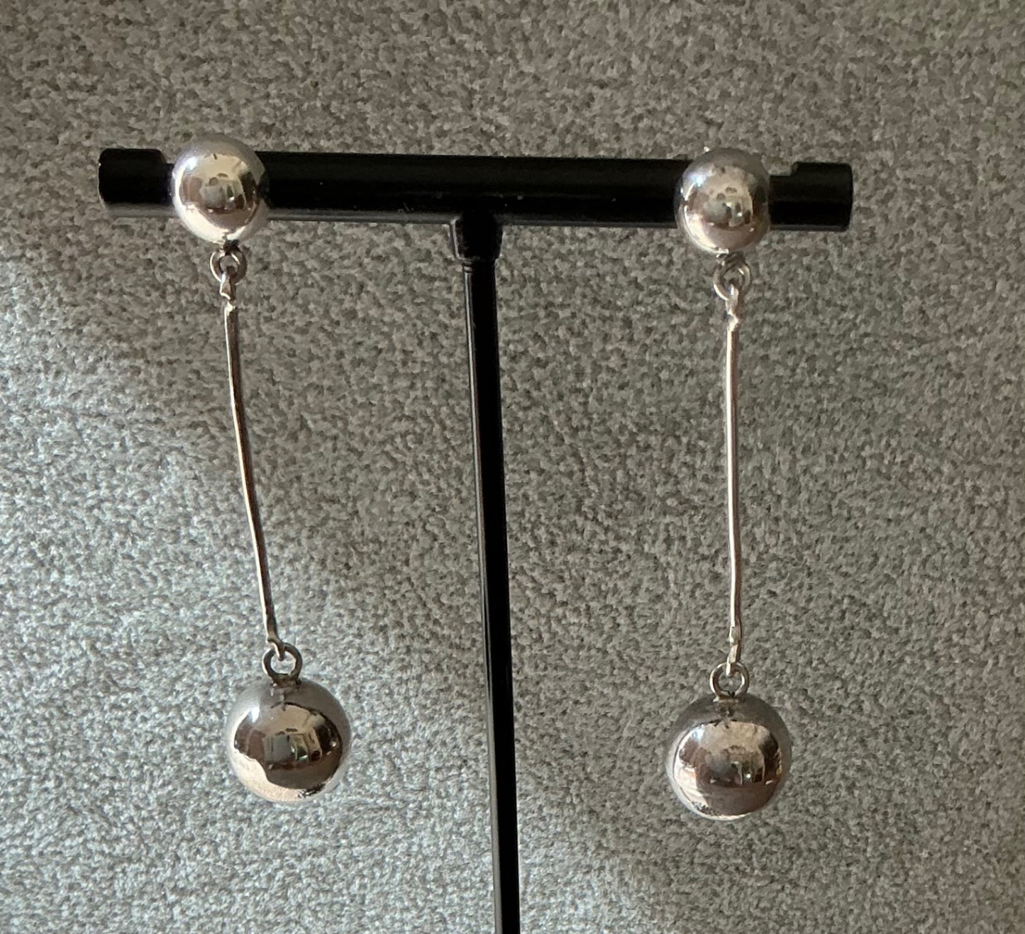 Silver ball dangle earrings