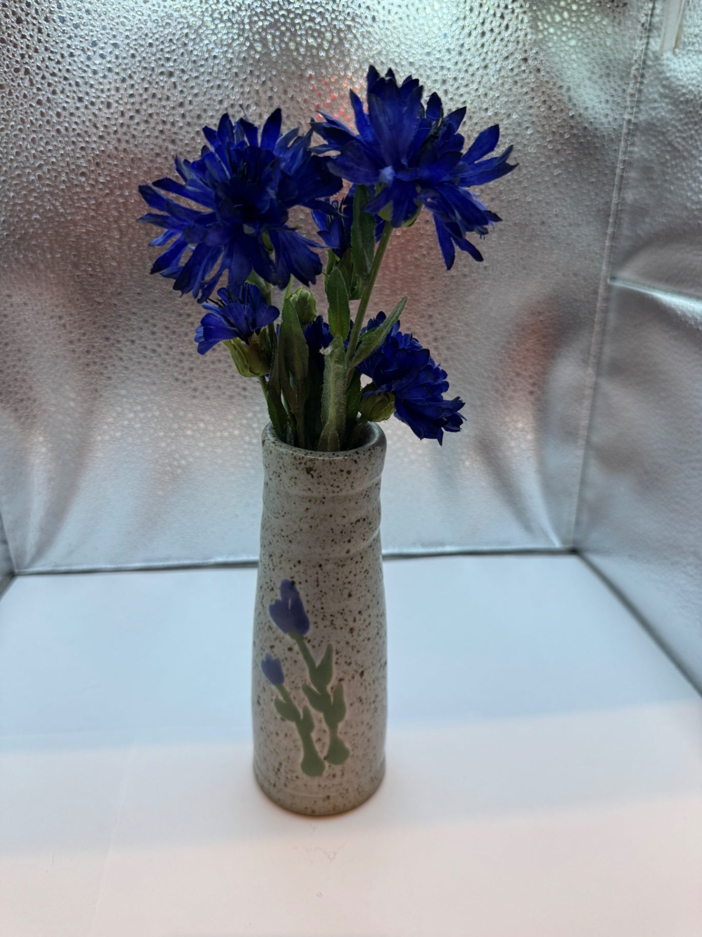 Pottery vase with flowers