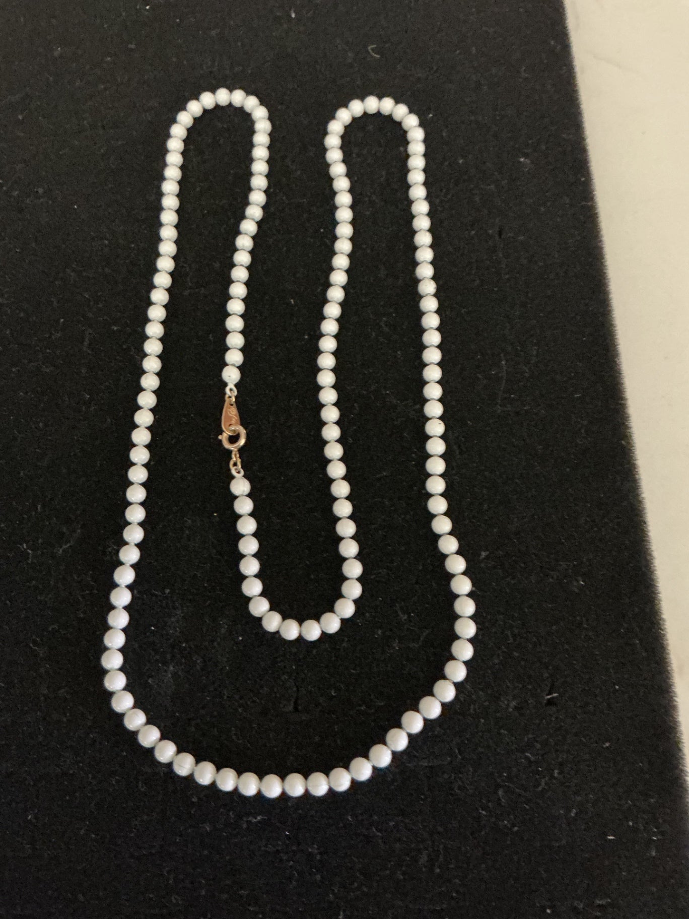 White metal bead costume strand necklace.