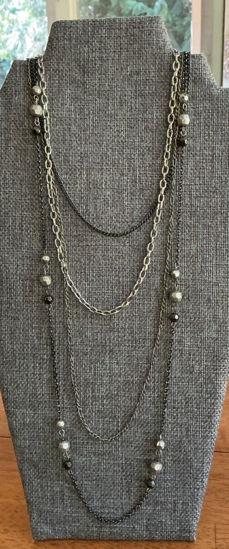 Multi- strand necklace