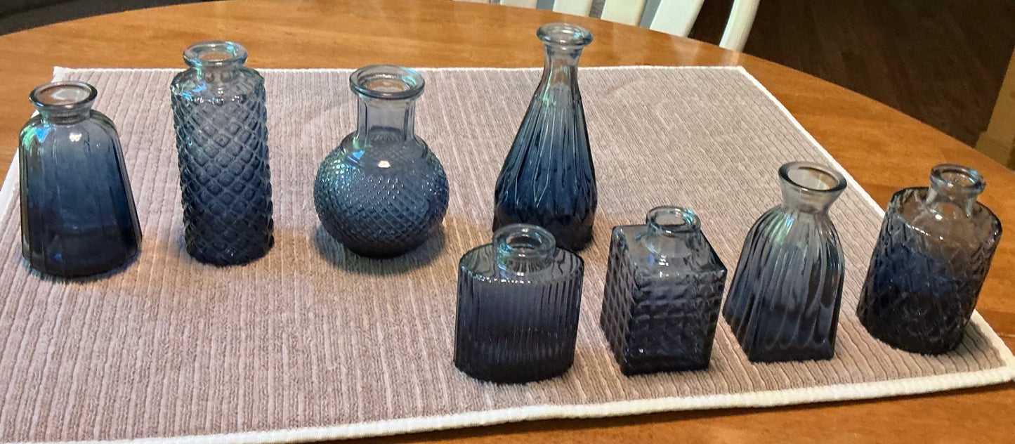 BLUE GLASS VASES.. $10 each