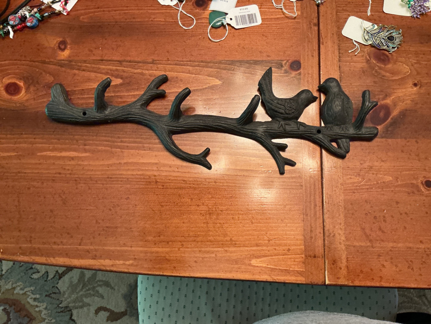 Cast iron birds on branch