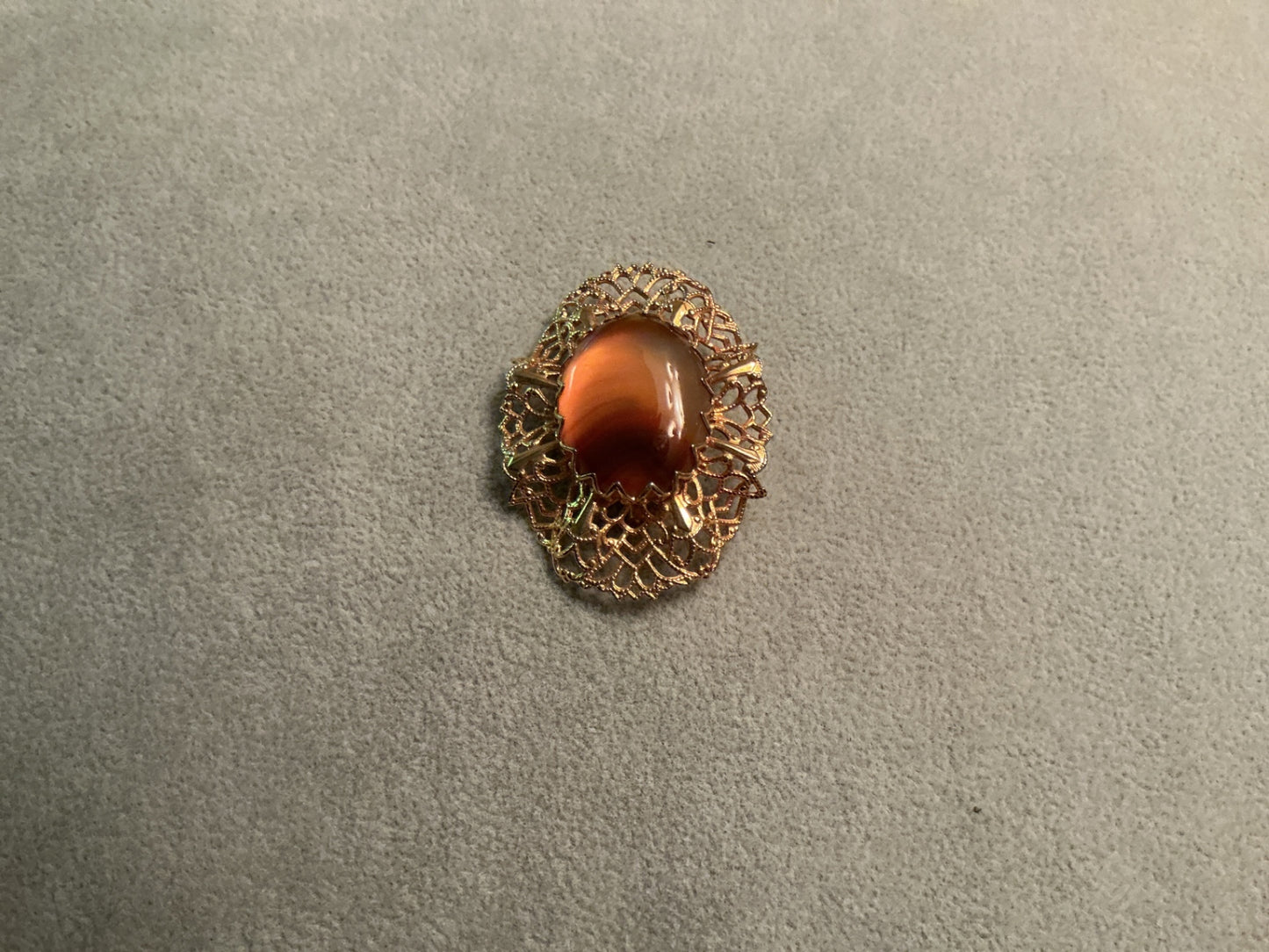 Filigree amber brooch