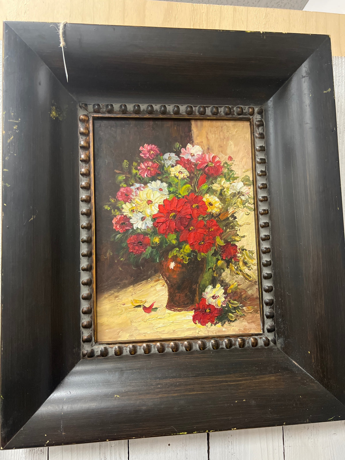 Art red flowers and wooden frame