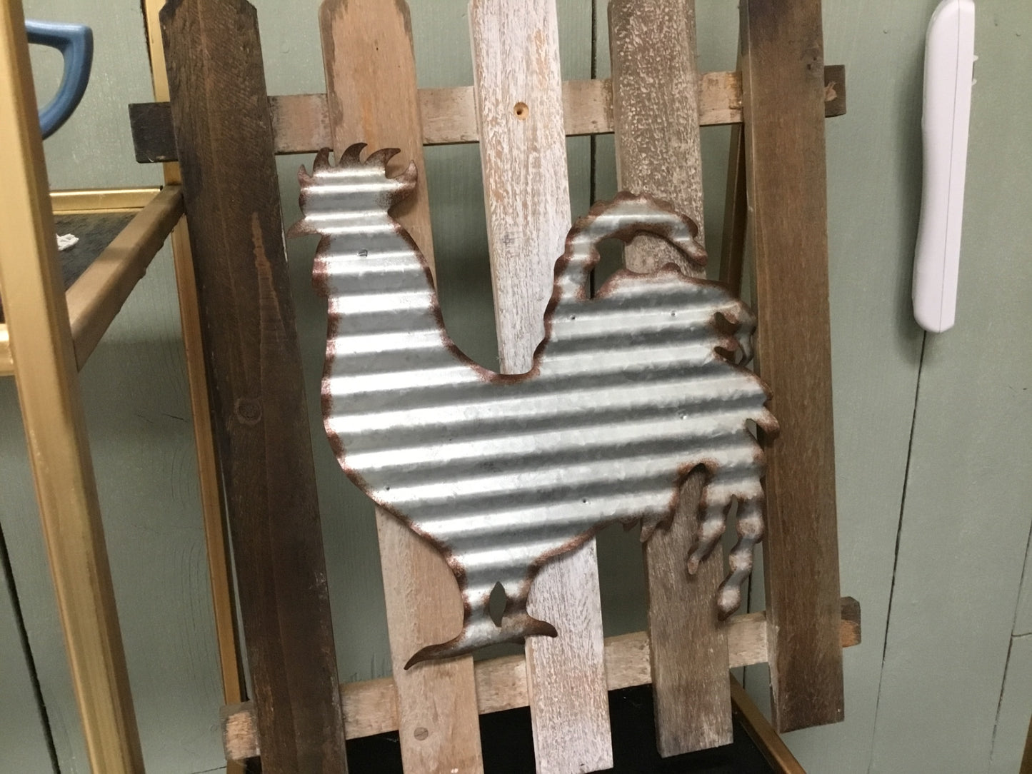 Galvanized Rooster on board fence