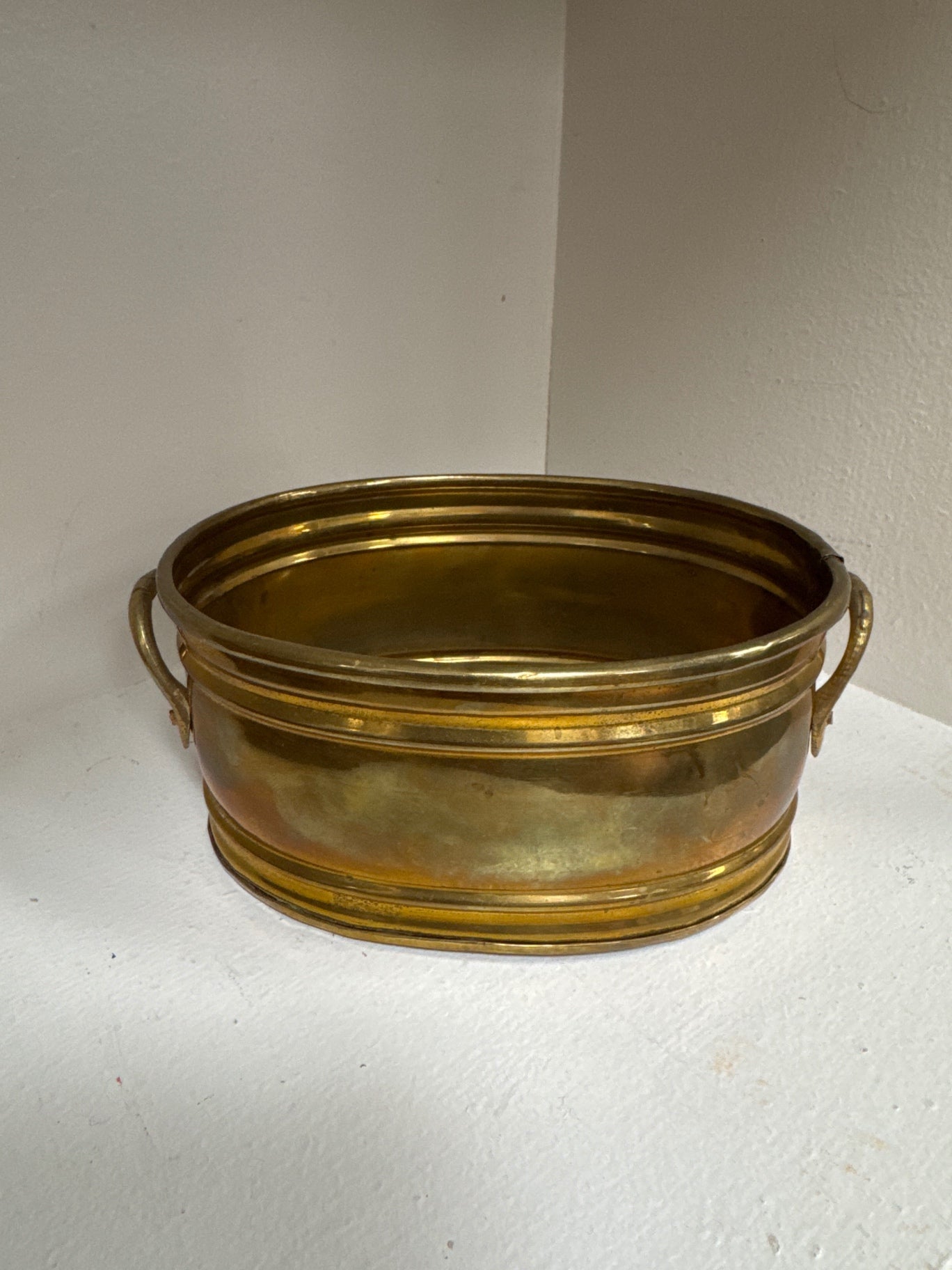 Oval brass bucket