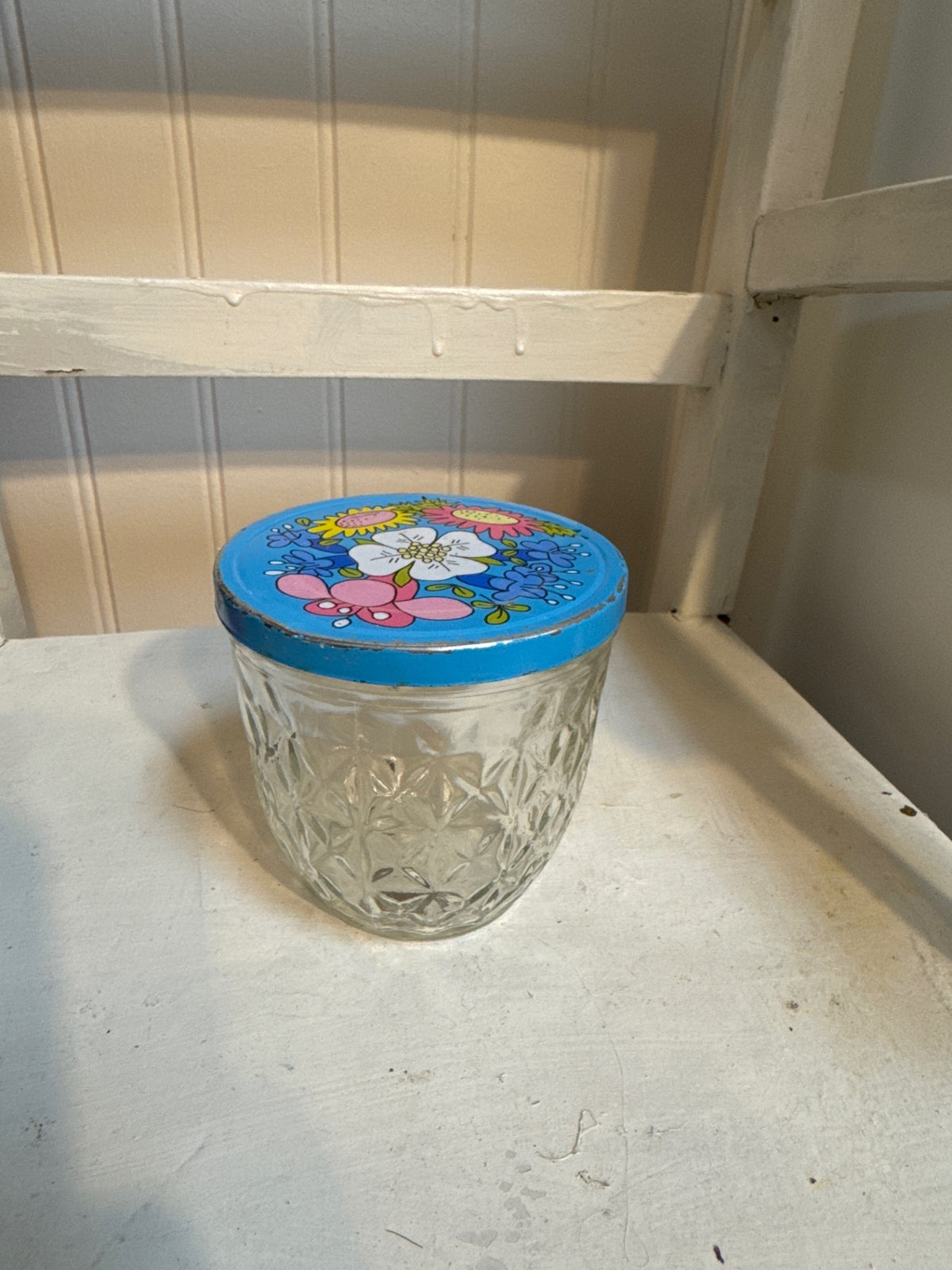 Vintage jam jar with blue lid