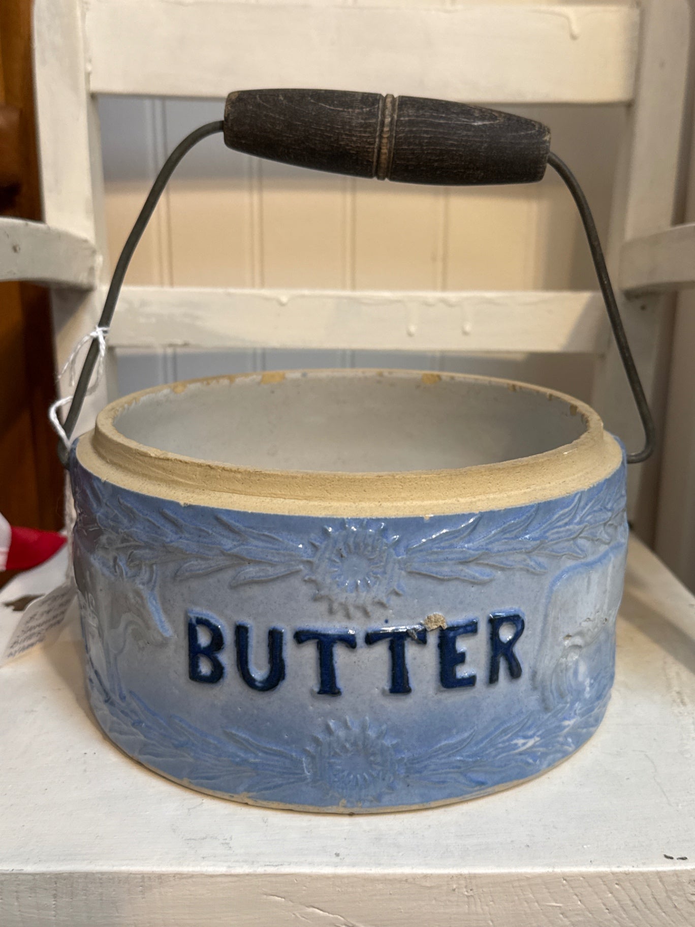 Stoneware butter crock with handle