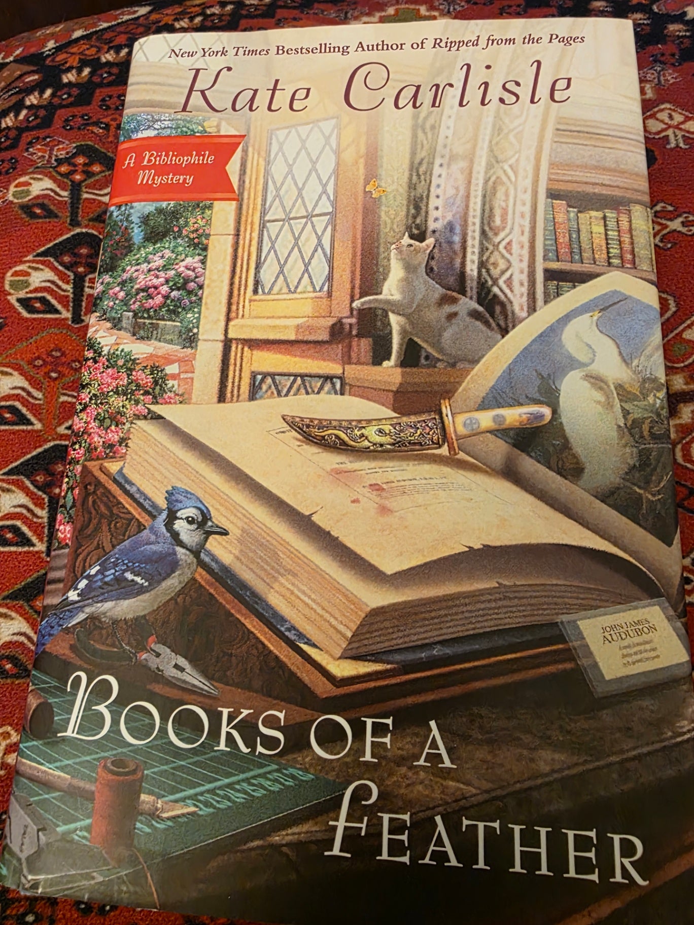BOOKS OF A FEATHER BY CATE CARLISLE.