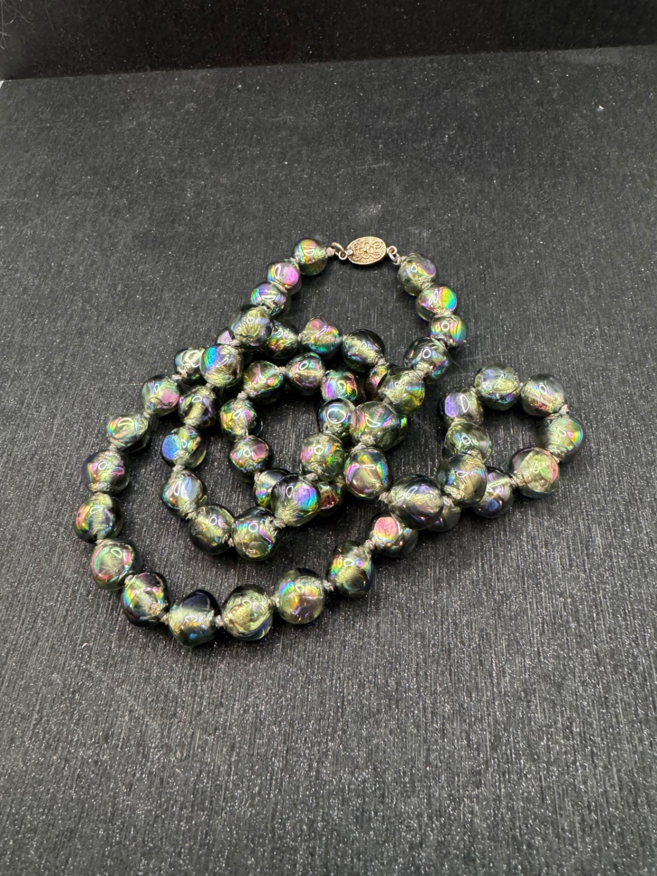 Silver clasp with glass beads