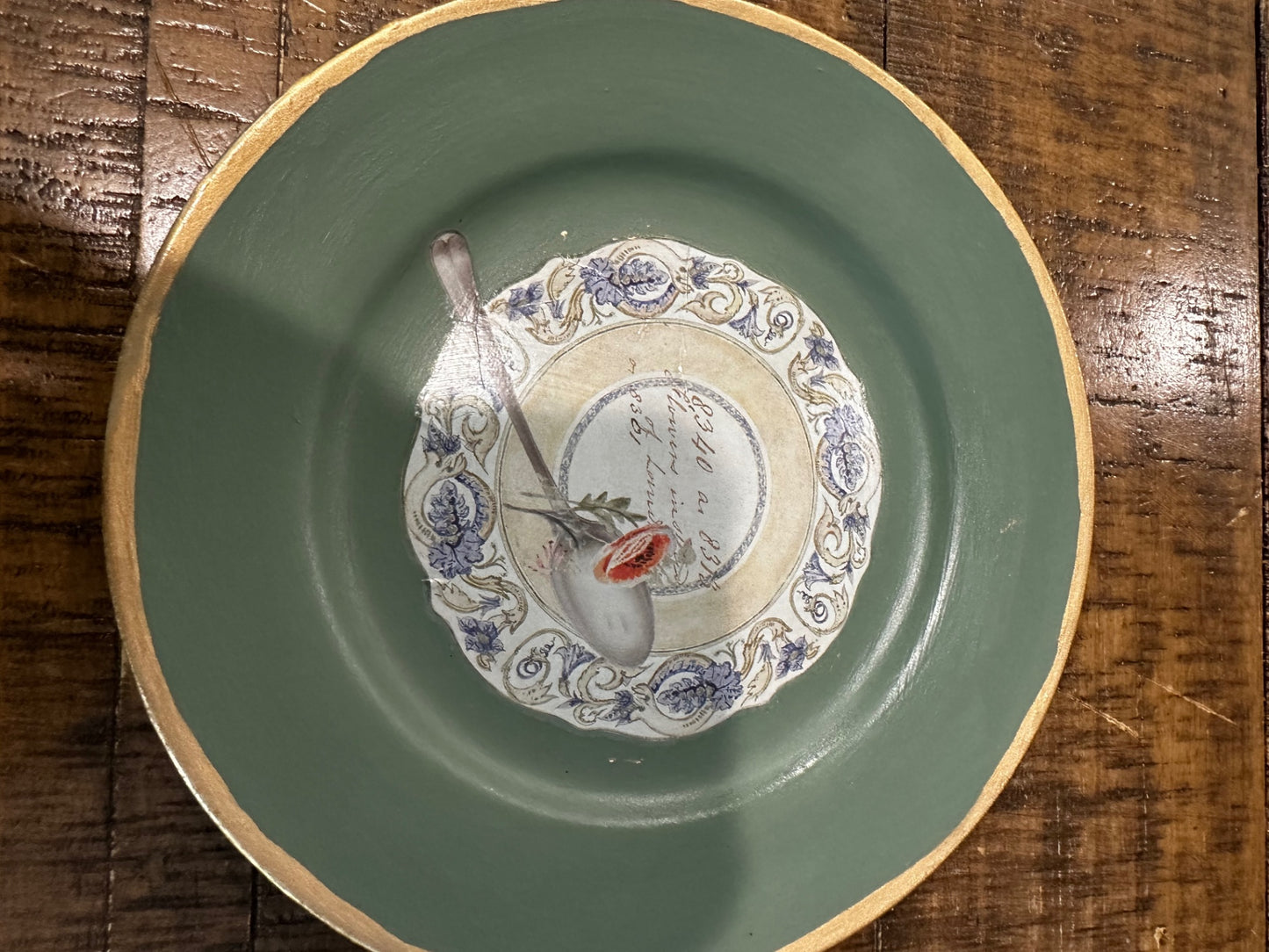 Green plate with tea cup