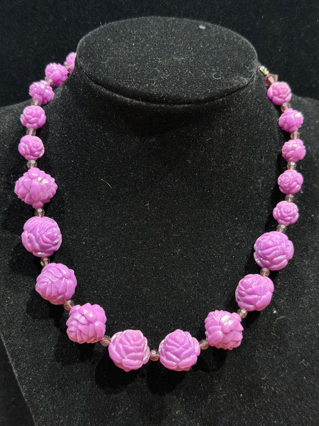 Purple plastic rosette necklace 16”