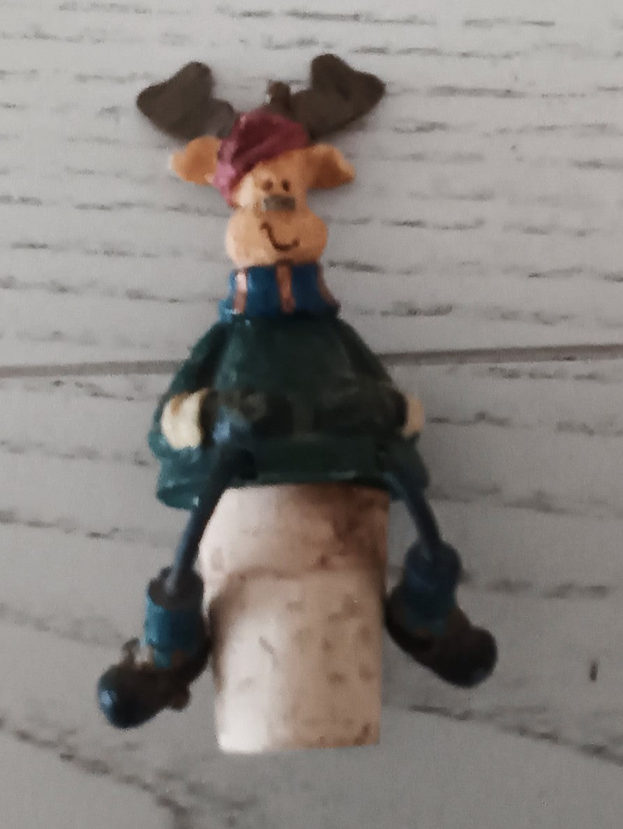 Moose sitting on Cork stopper