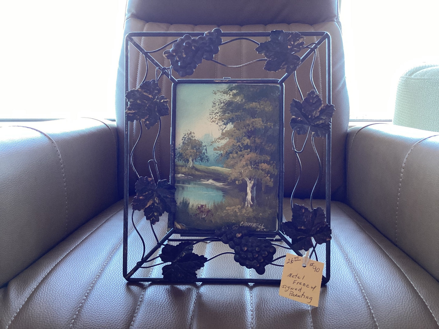 Metal frame signed painting