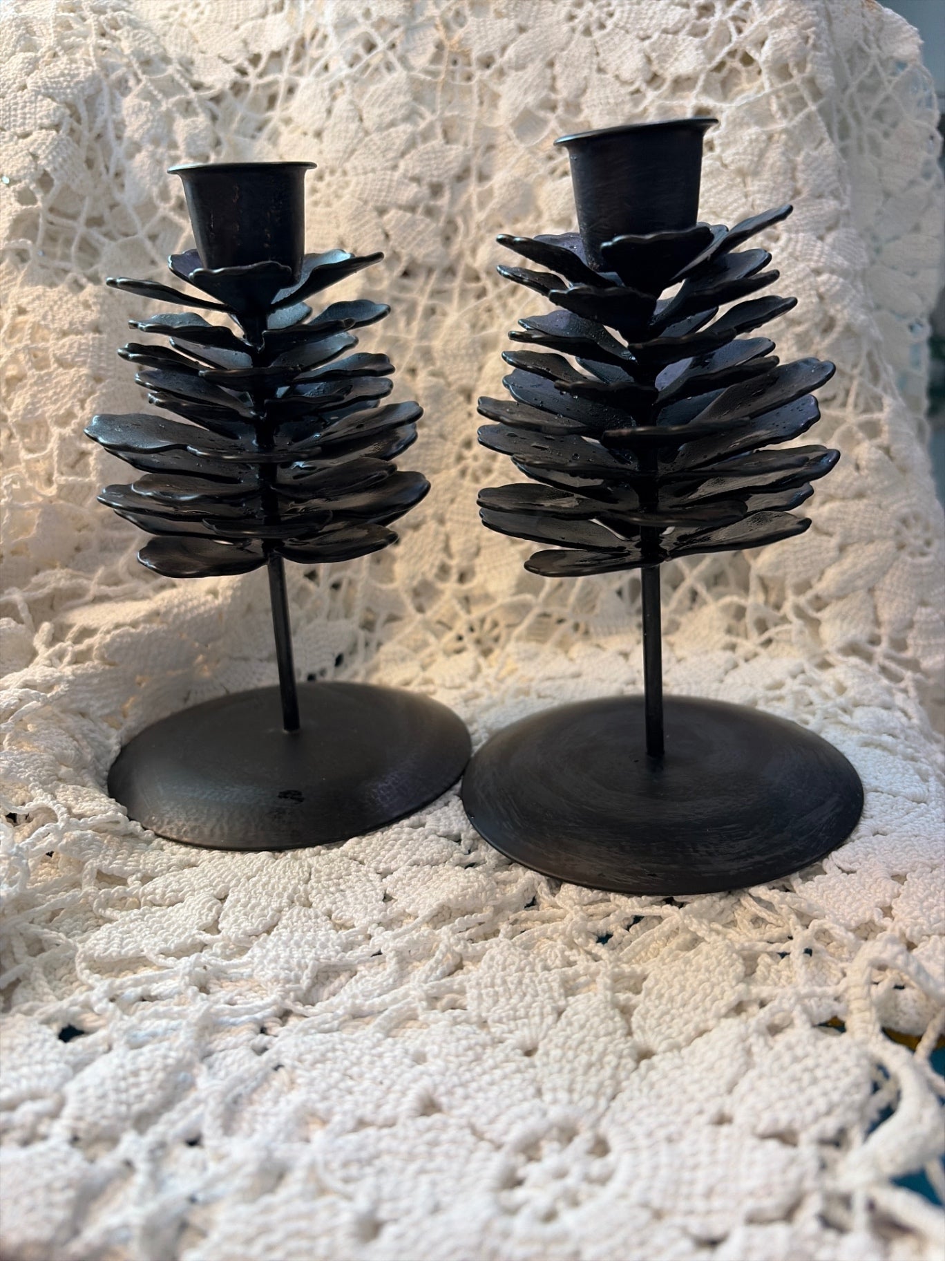 Black painted metal pinecone candle holders set of (2)