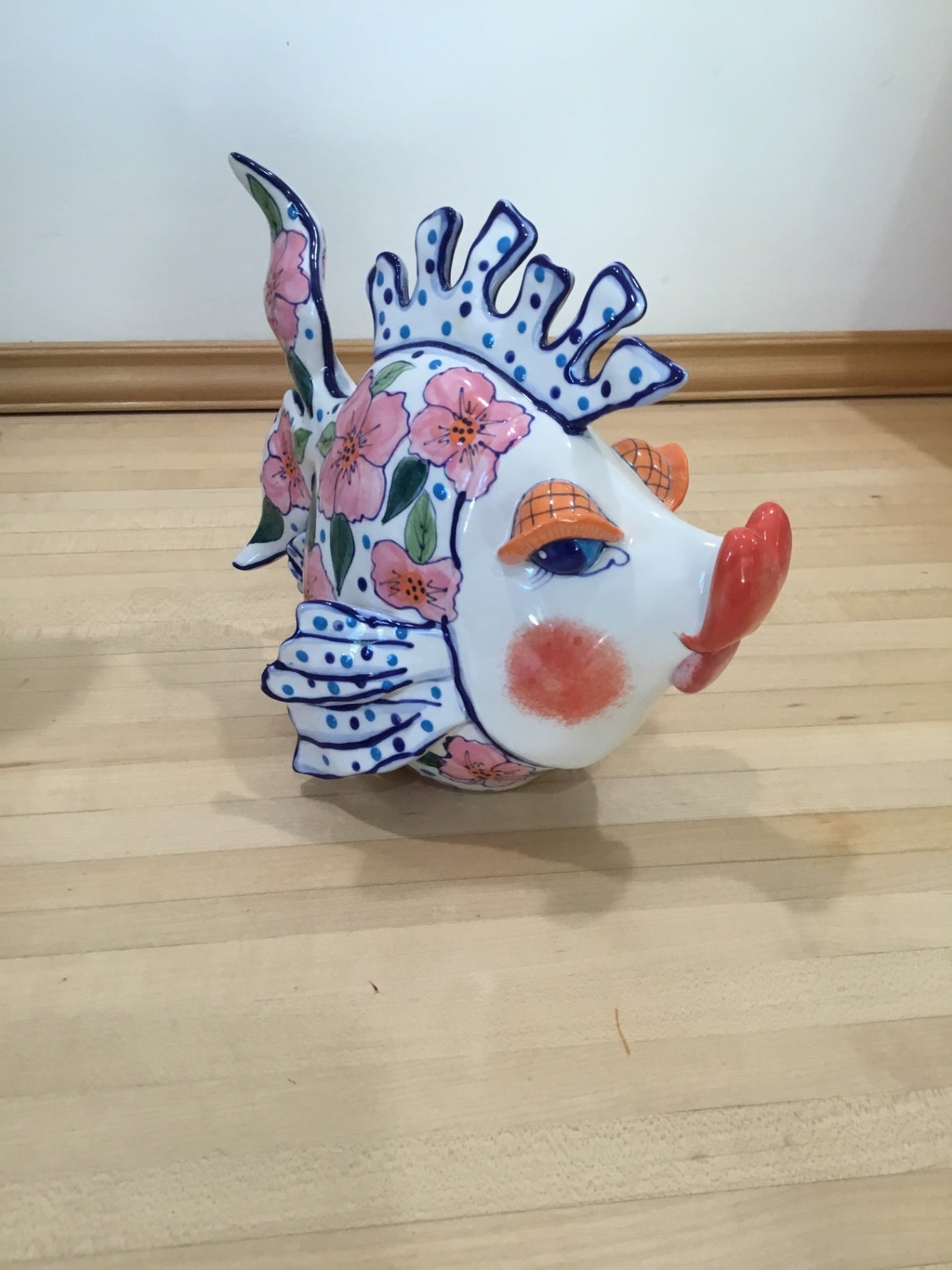 Colorful, ceramic, kissing fish figurine