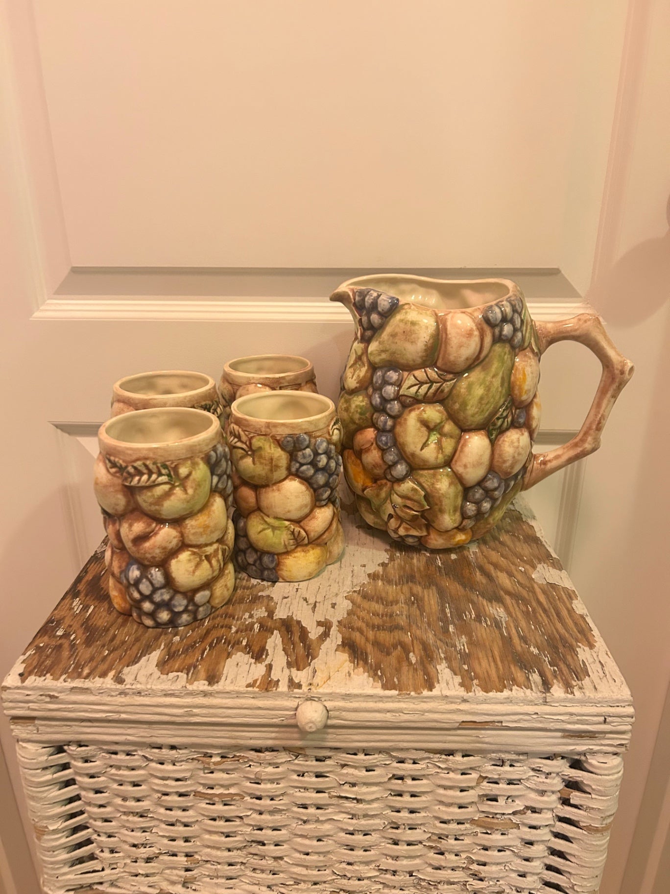 pitcher and cups
