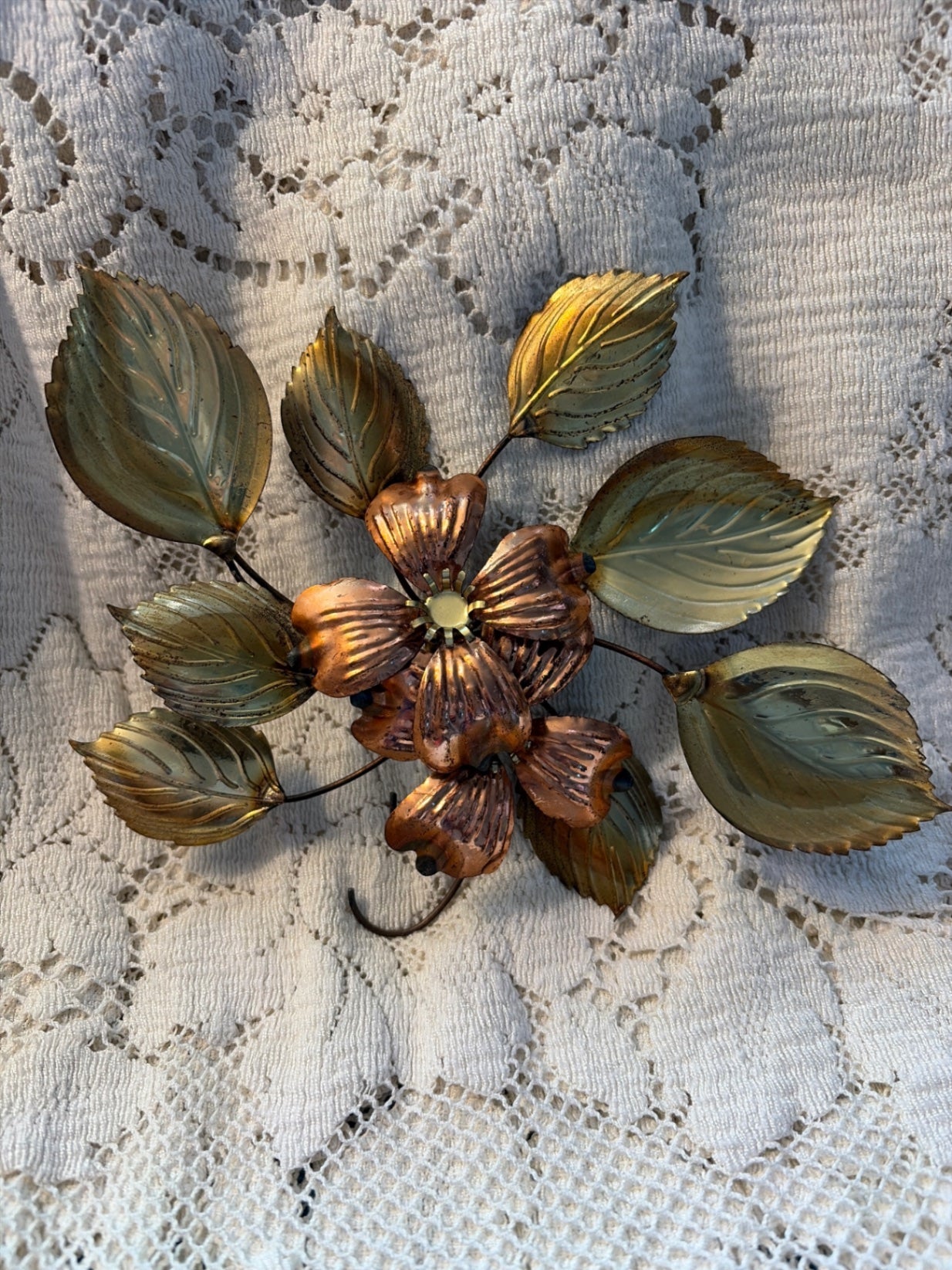 Brass and copper 9” wall hanging. Dogwood flowers