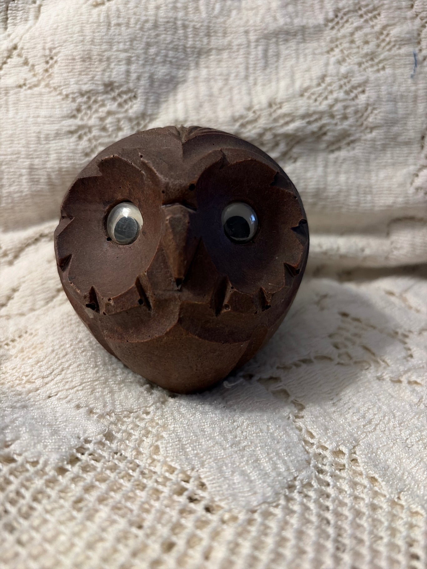 Round carved wooden owl