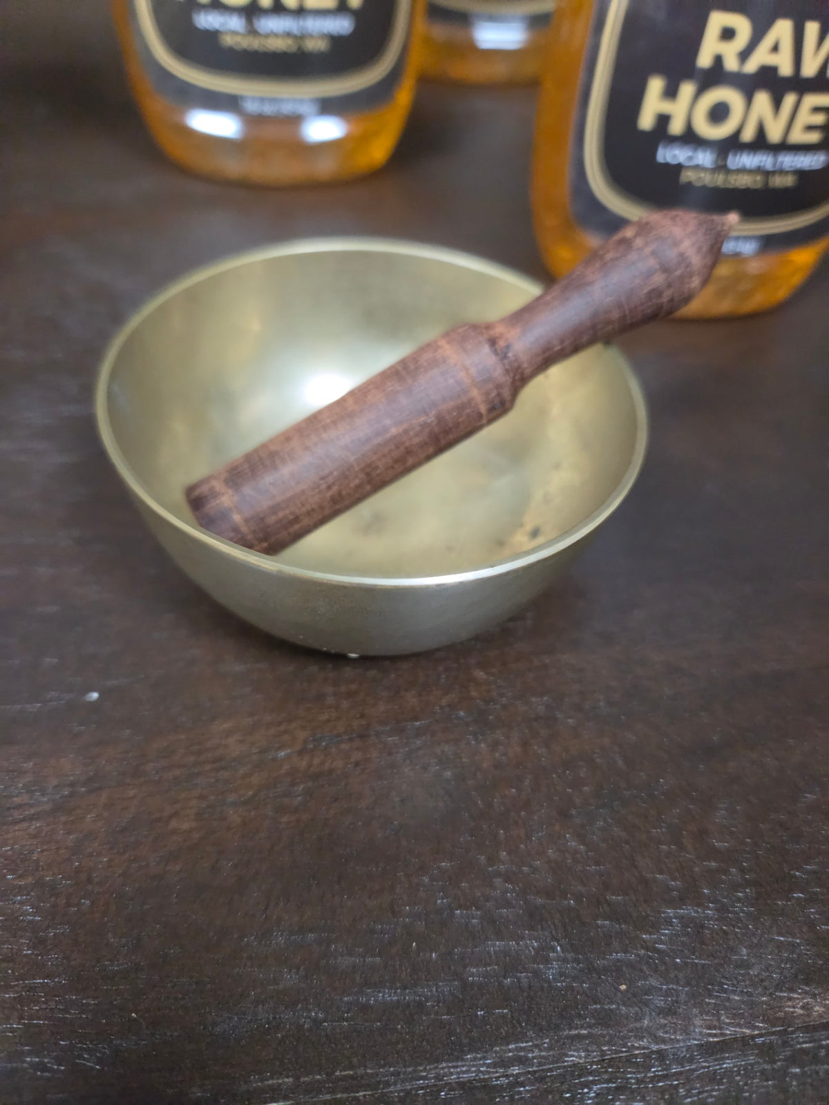 Brass/wood singing bowl