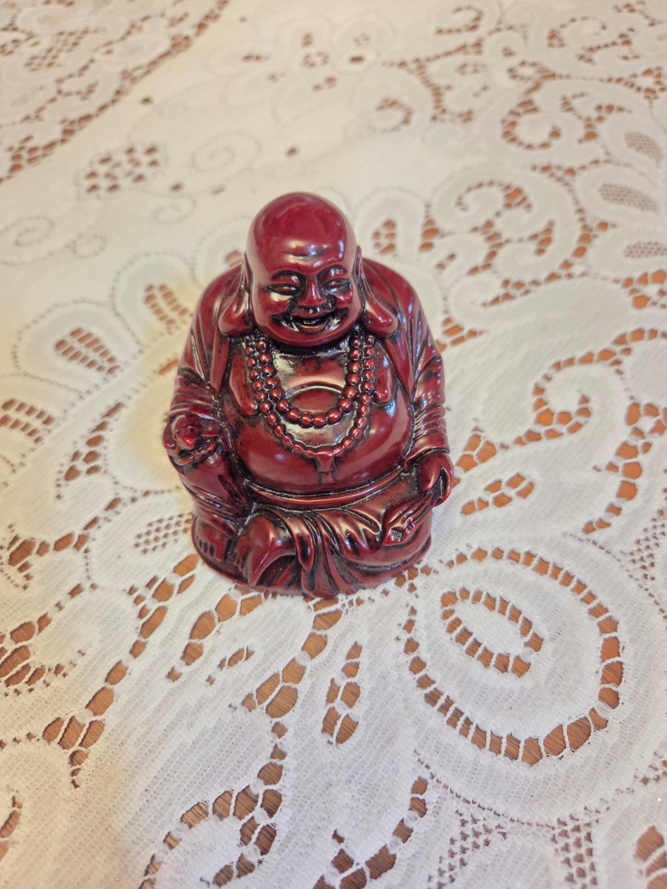 Laughing budha figurine