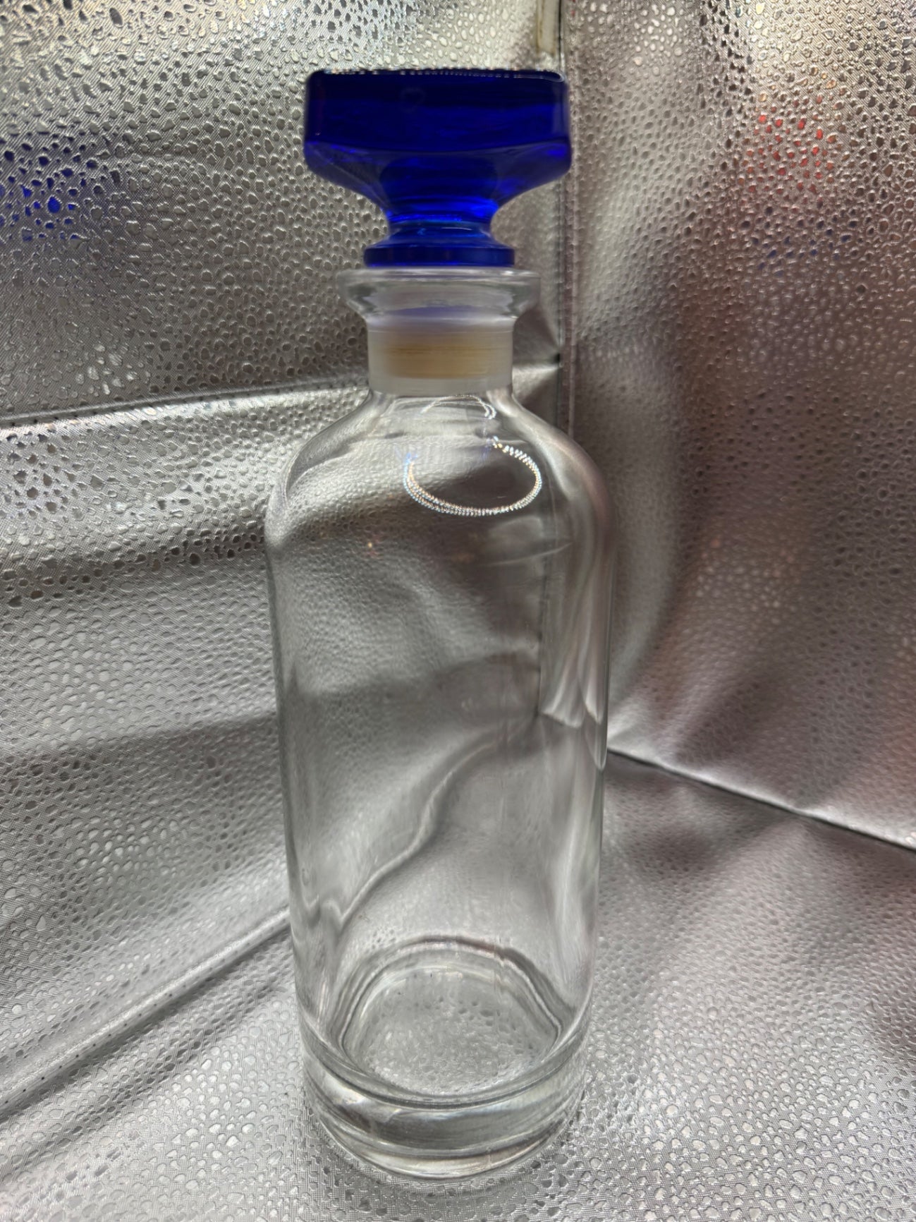 Decorative Glass Bottle with Blue Stopper