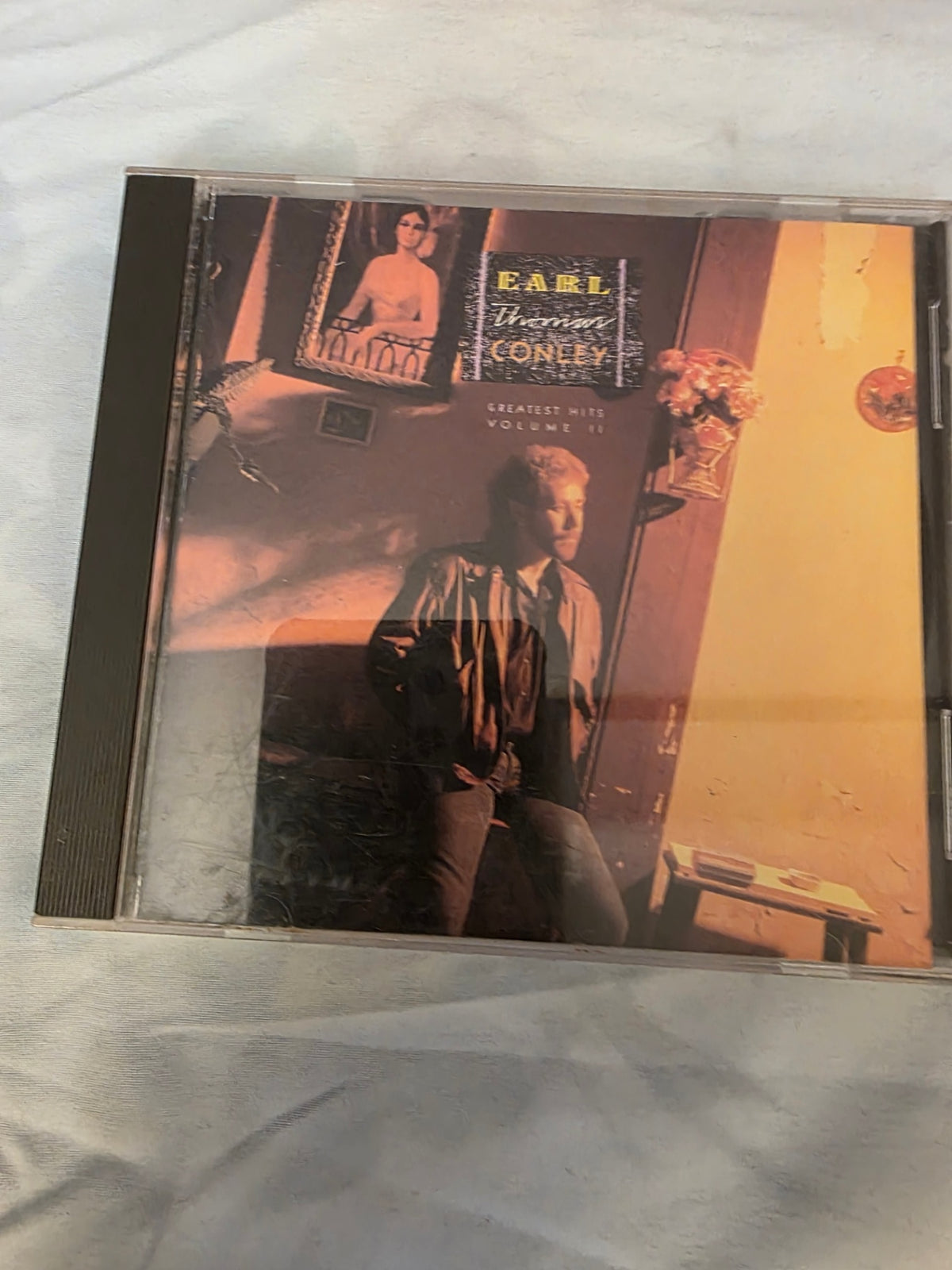 EARL THOMAS CONLEY. COUNTRY?