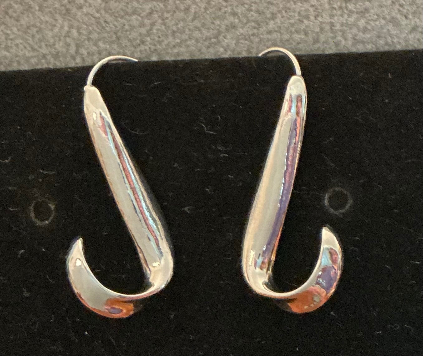 Silver-tone curved earrings