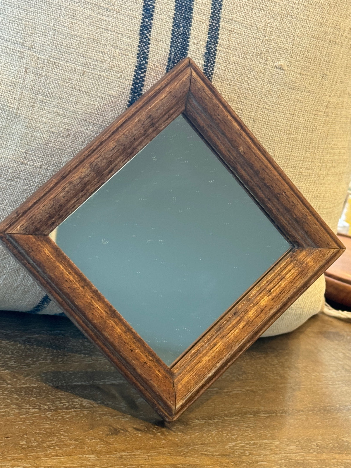 Small vintage wooden wall mirror