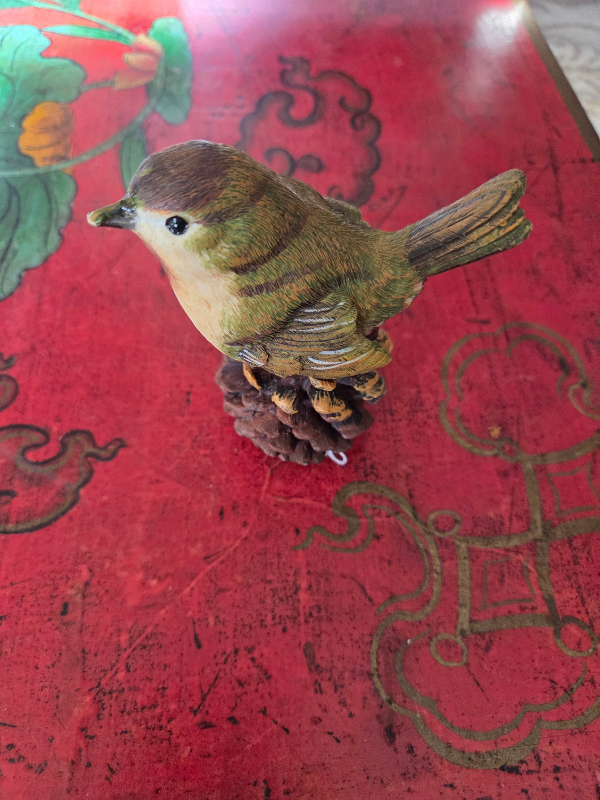 Bird on acorn