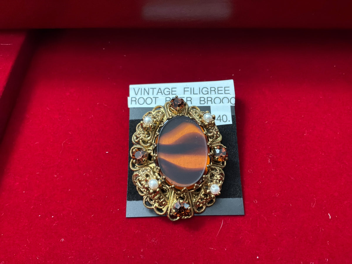 JewelryVintage filigree Root Beer brooch