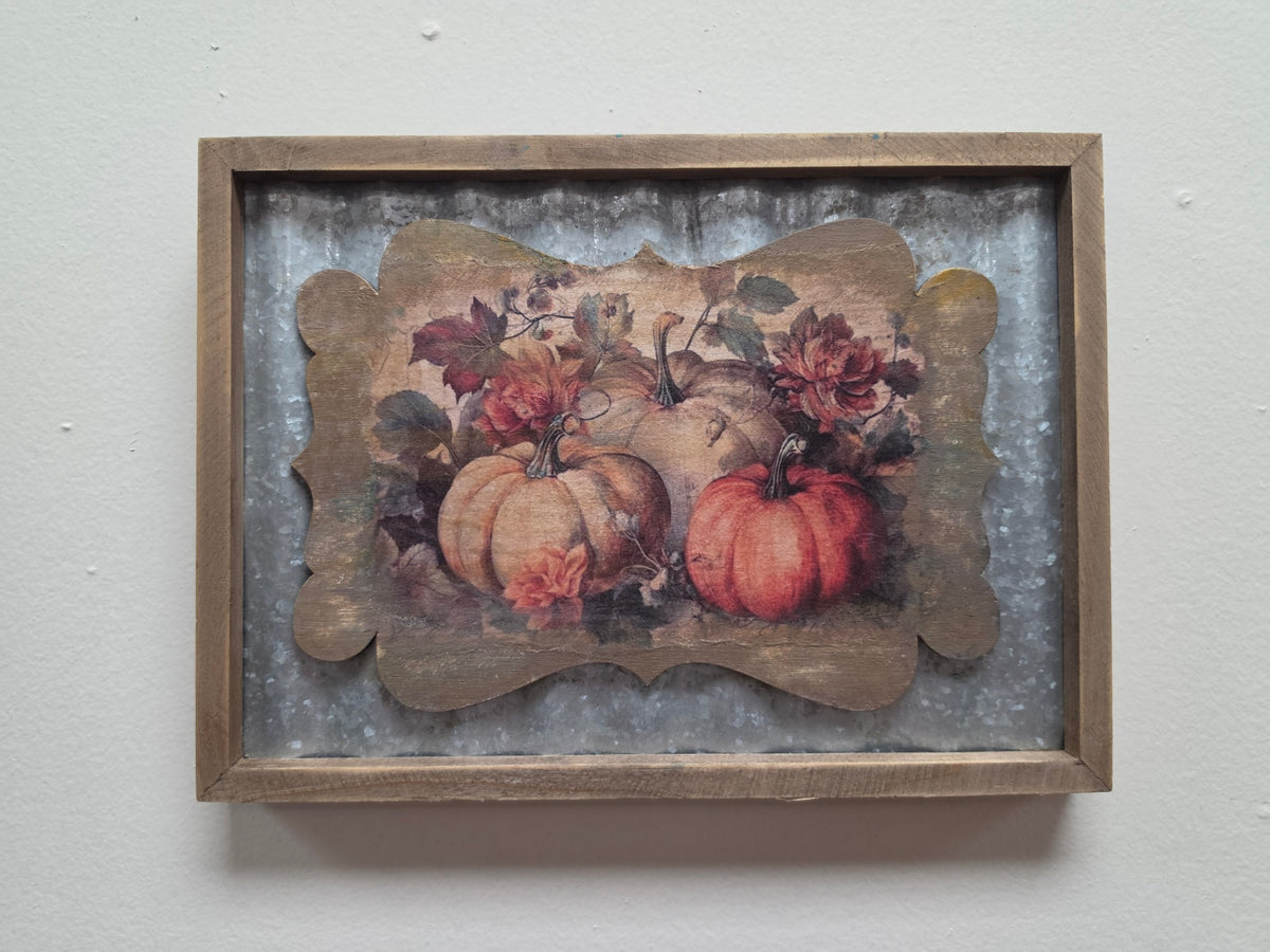 Metal sign with pumpkins