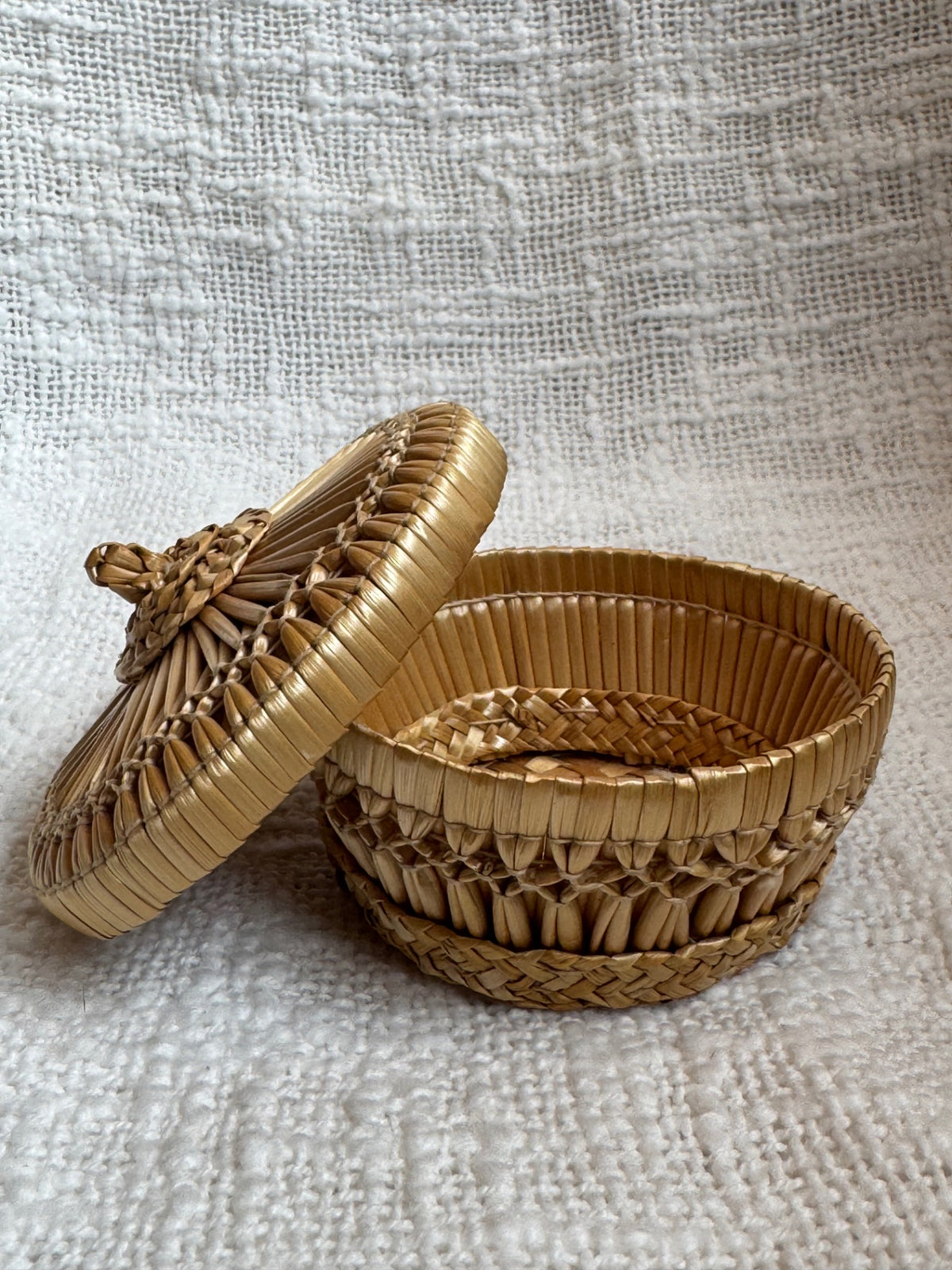 Small woven lidded basket