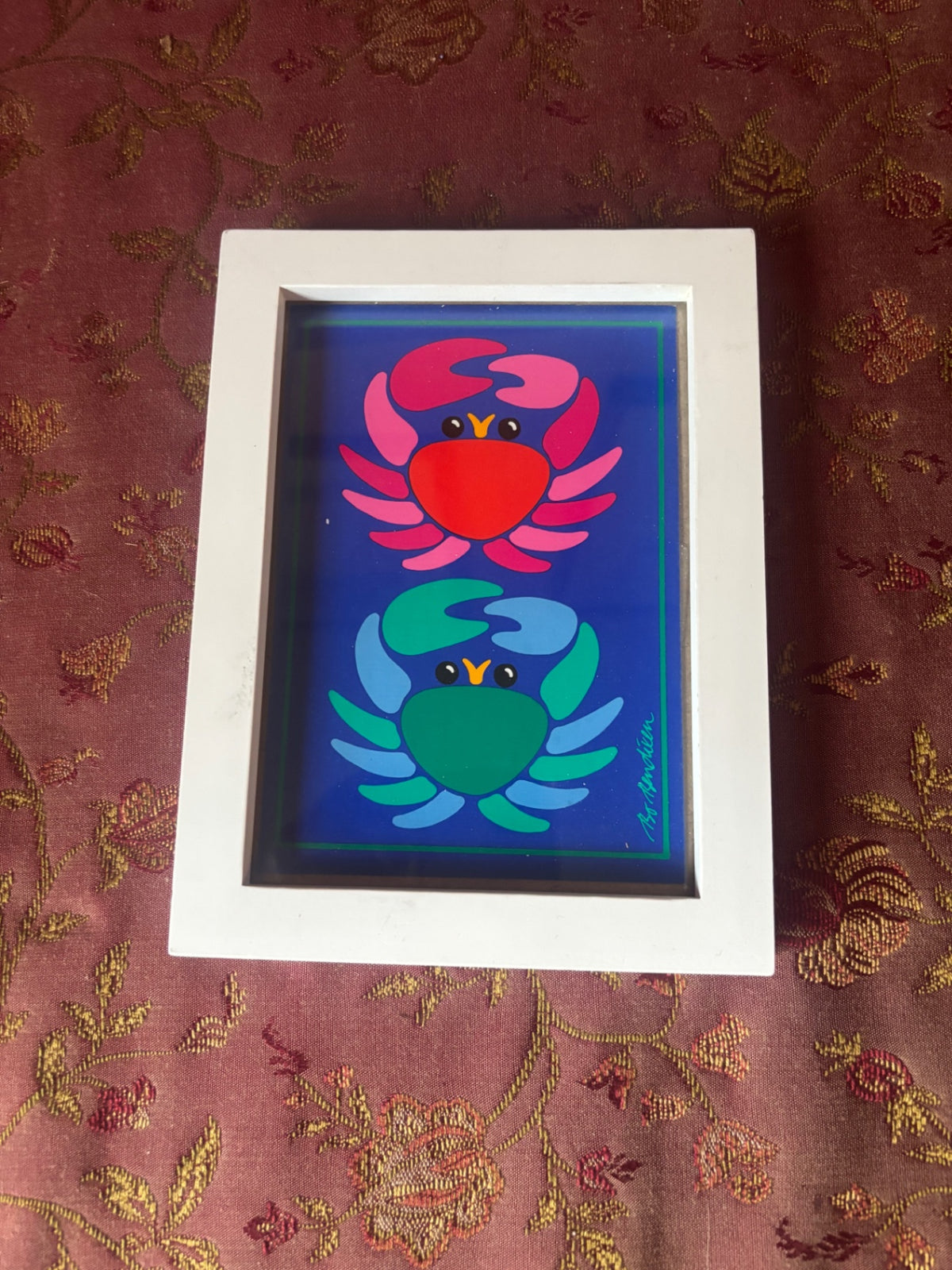 Small wooden framed colorful happy crabs