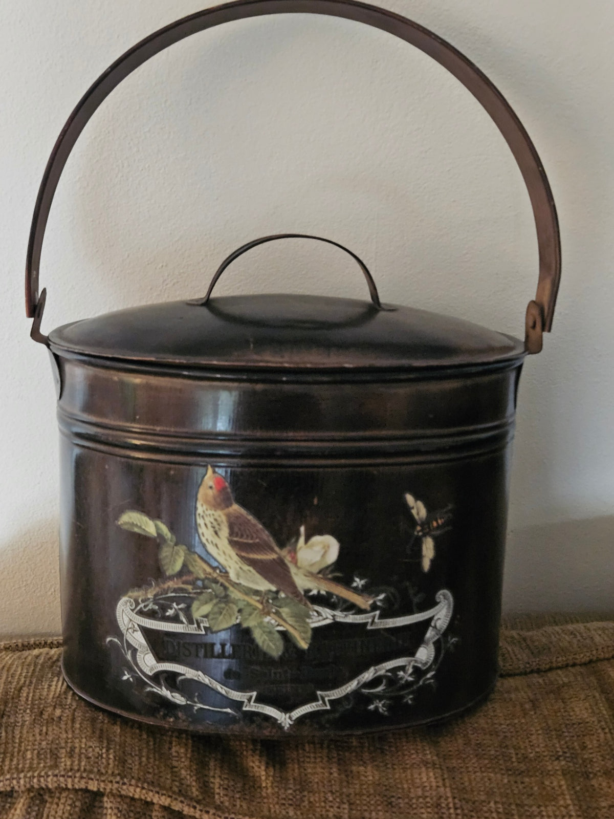 Brown metal bucket w/bird deco