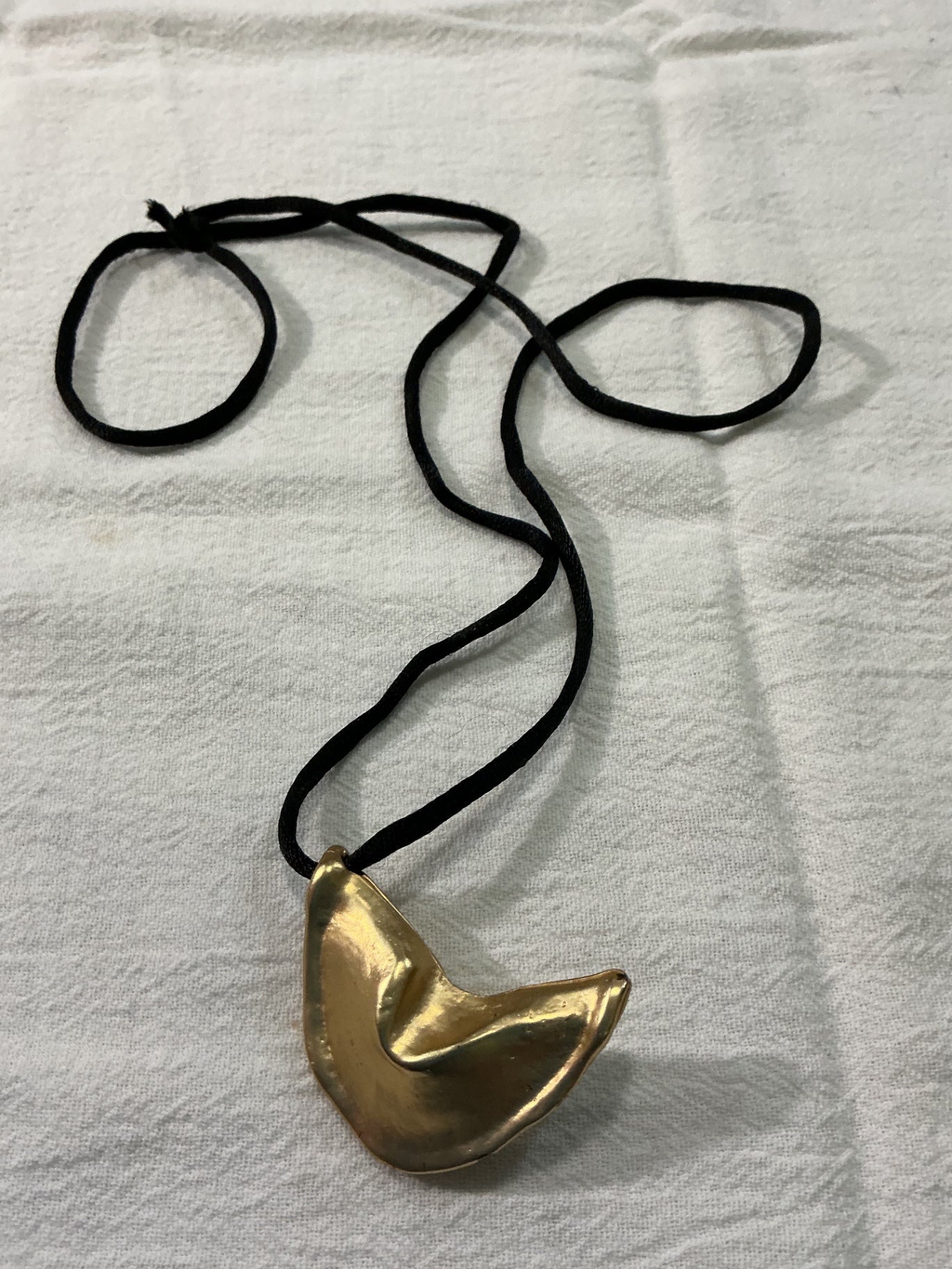 Unique “Fortune Cookie” pendant