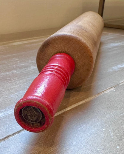Vintage rolling pin with red handles