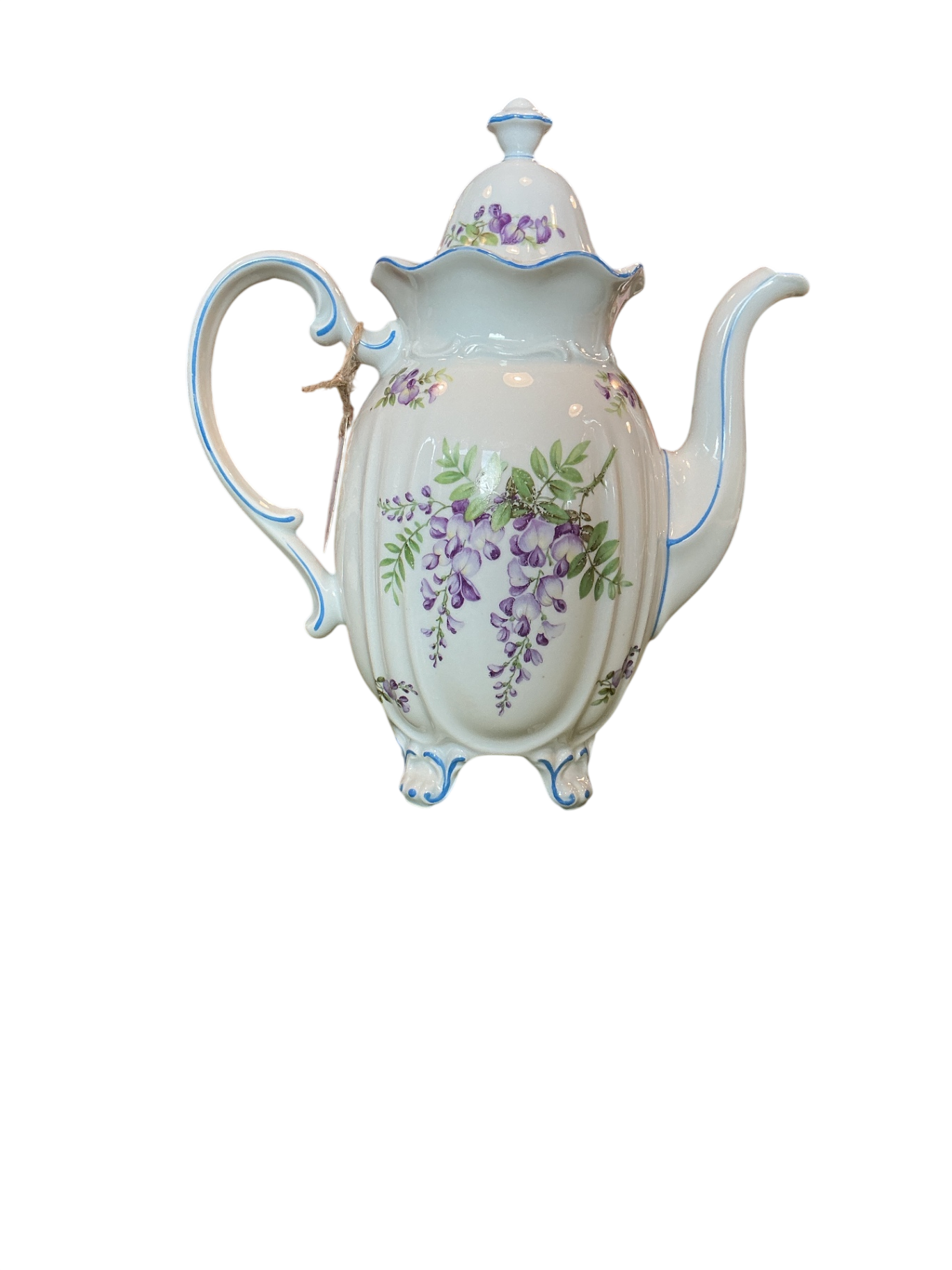 Vintage teapot with purple and green floral pattern