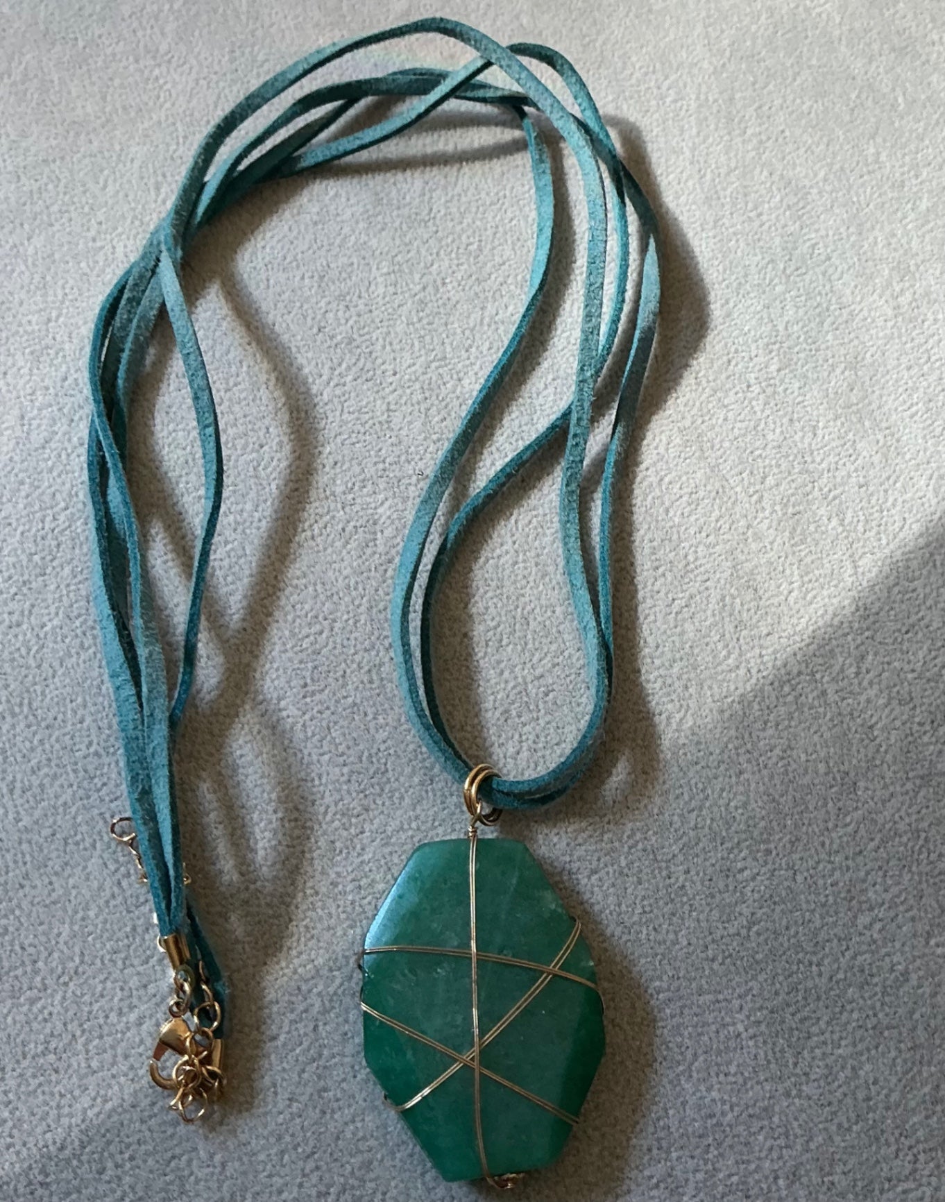 Wire wrapped stone pendant