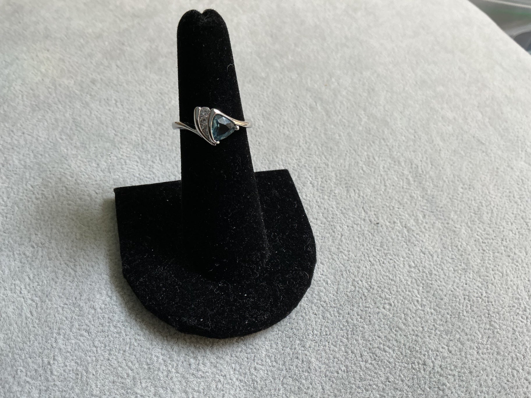 Blue Zircon w/ CZ stones ring. Size 8