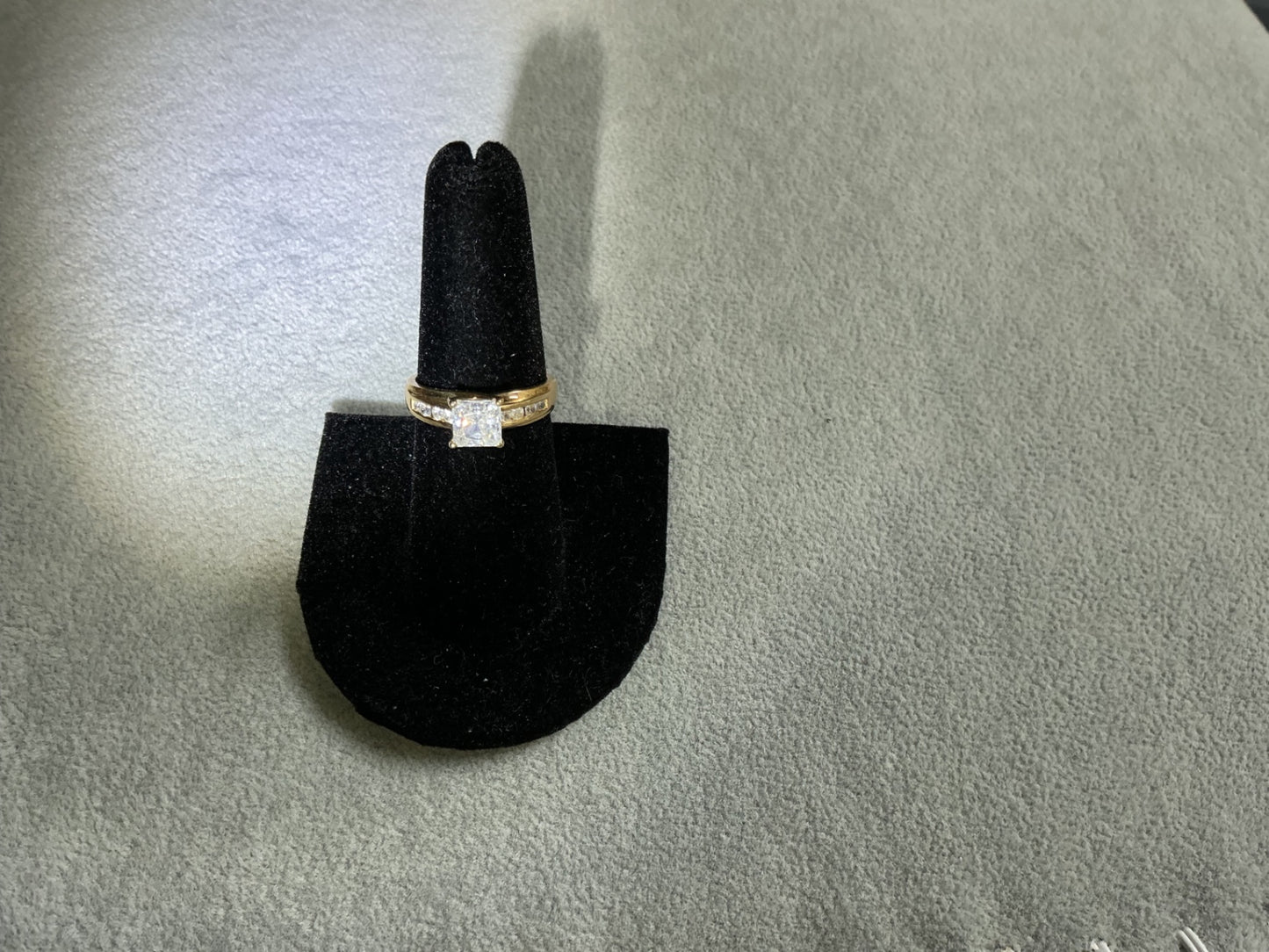 Simple solitaire clear cut crystal ring.  Size 8