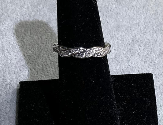 Sweet sterling twist band w/ tiny CZ stones.  Size6