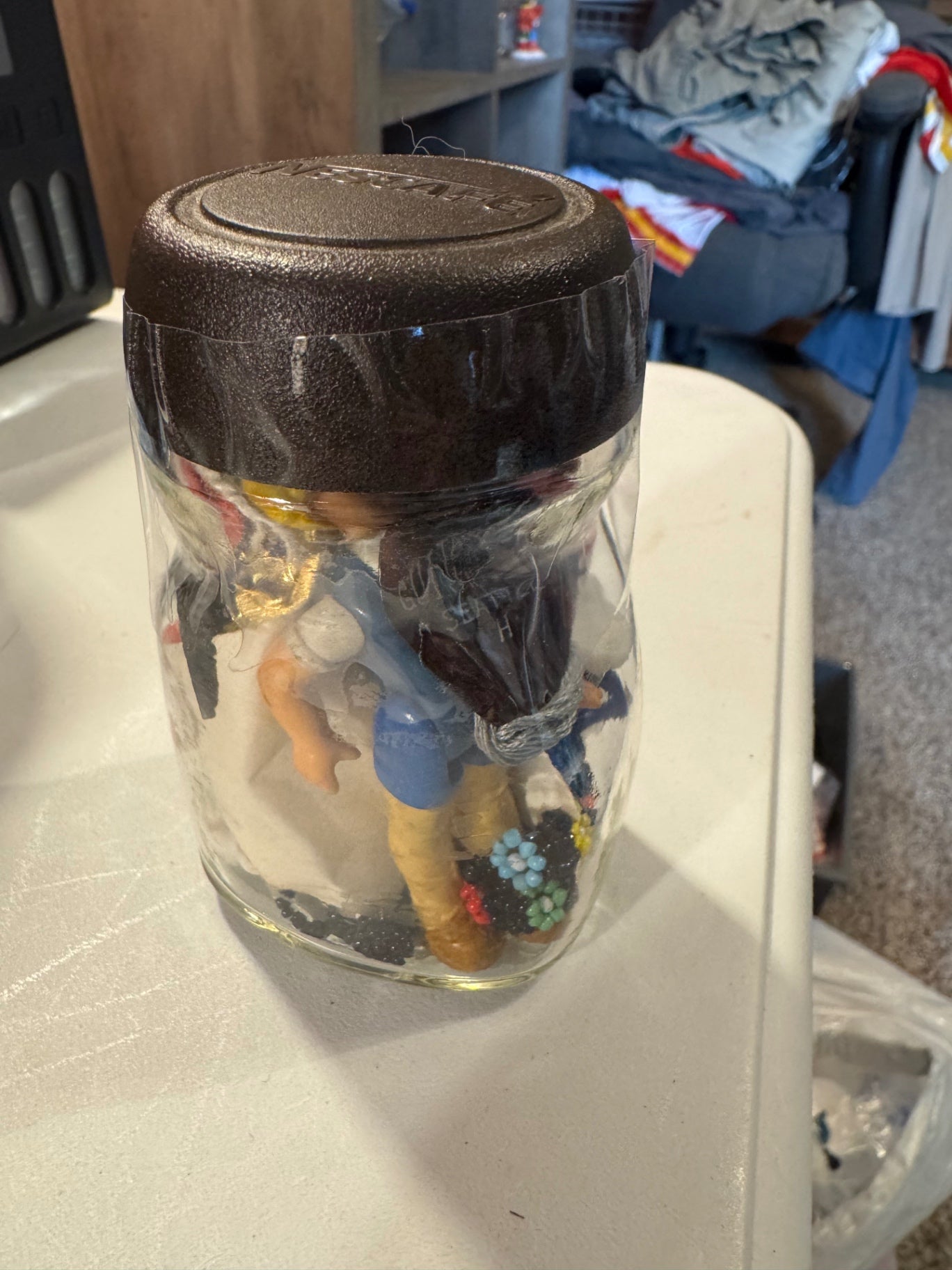Jar with vintage miscellaneous items