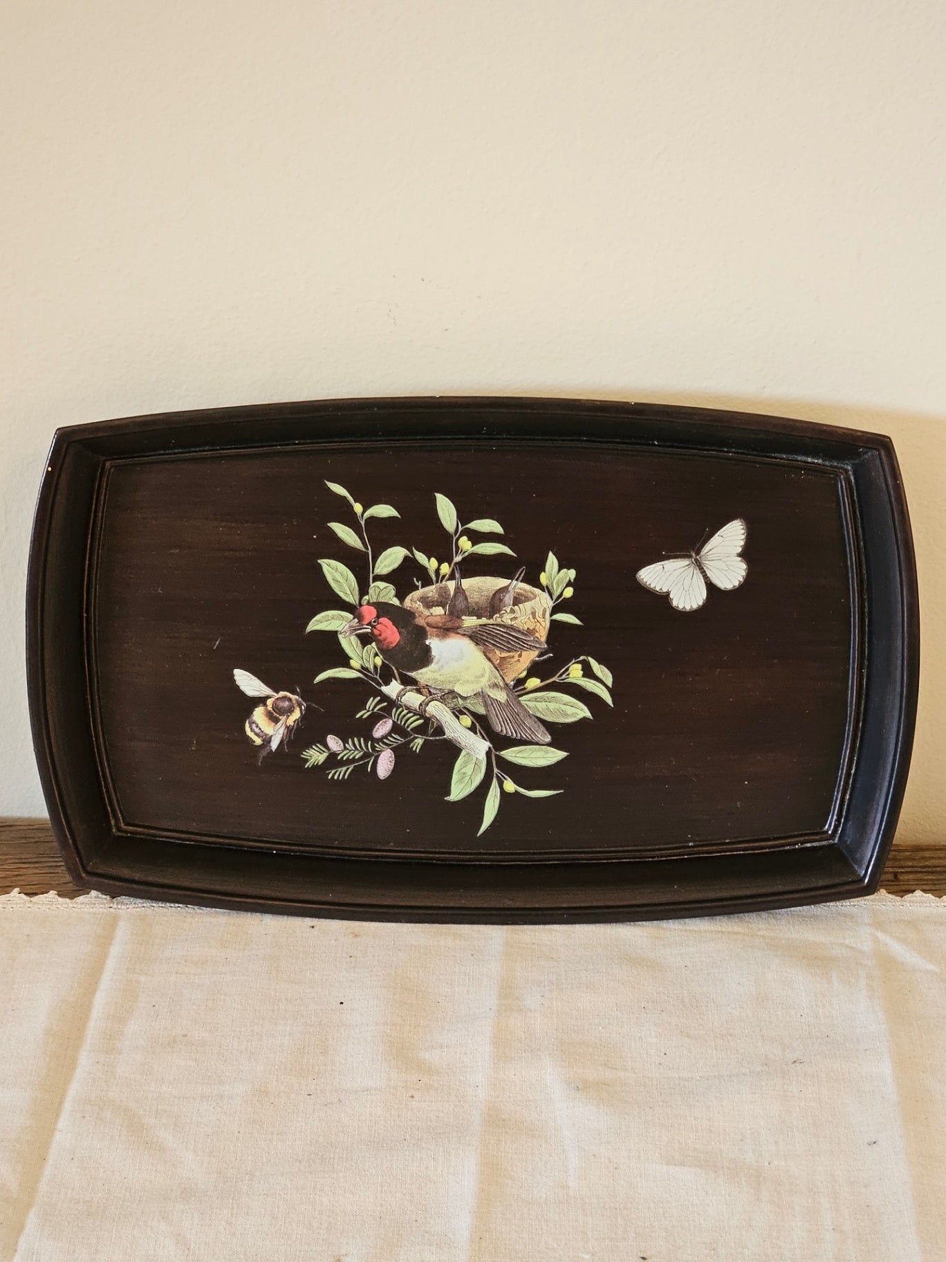 Small black tray with bird /floral motif