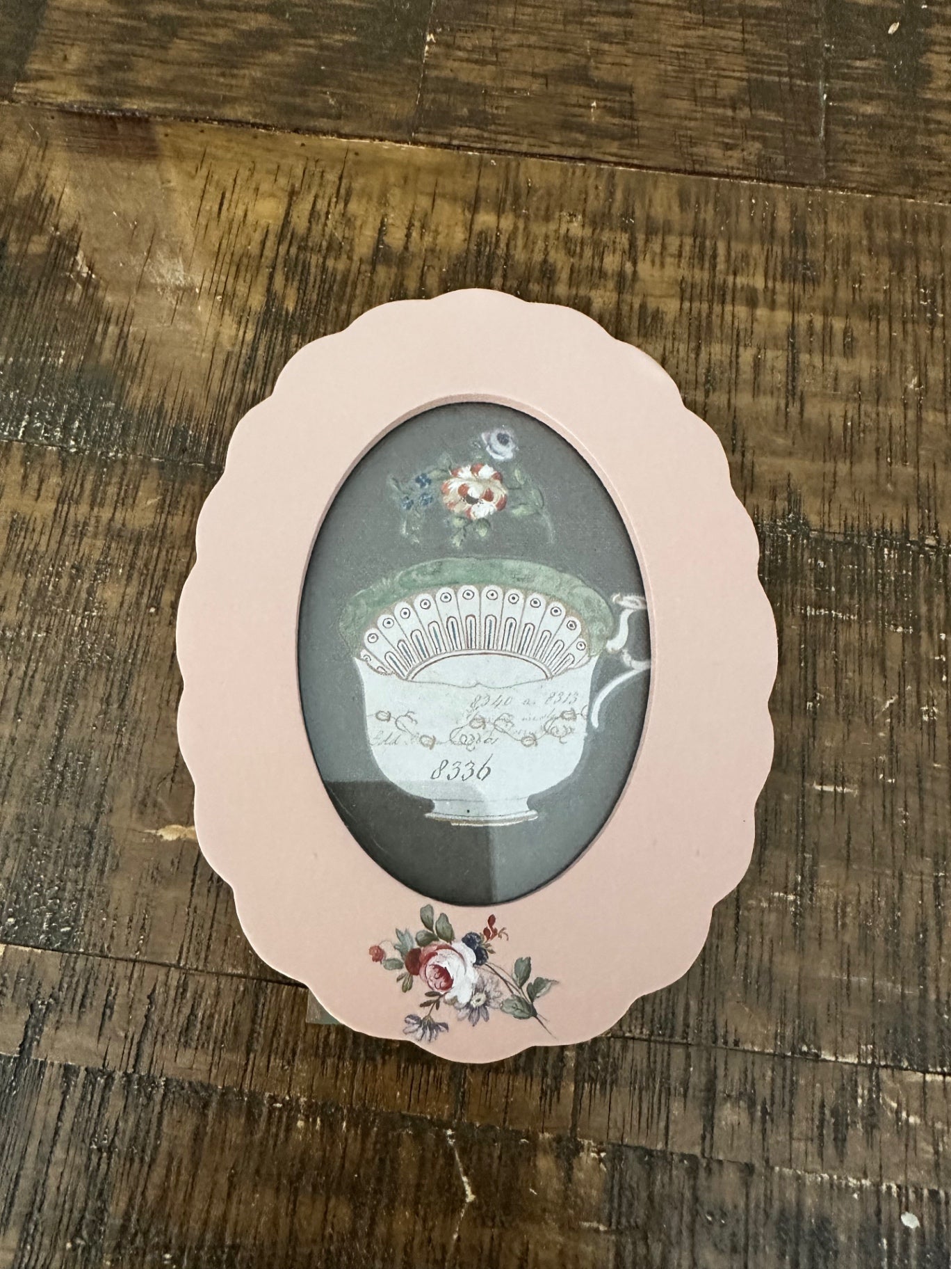 Pink frame with tea cup