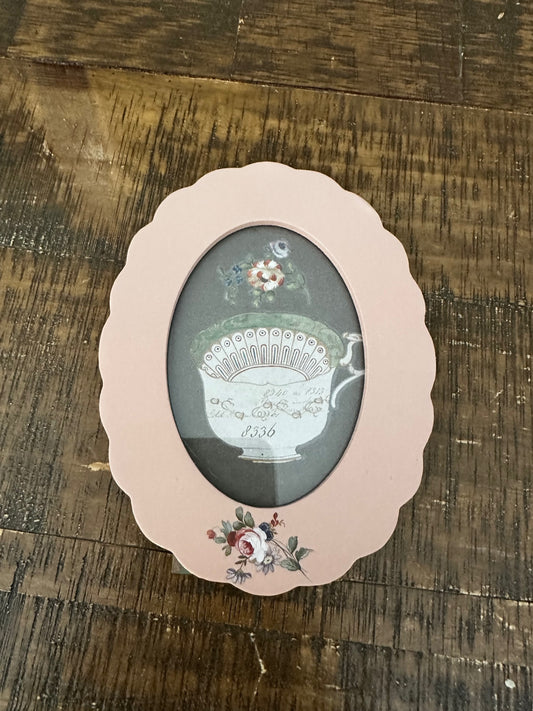 Pink frame with tea cup