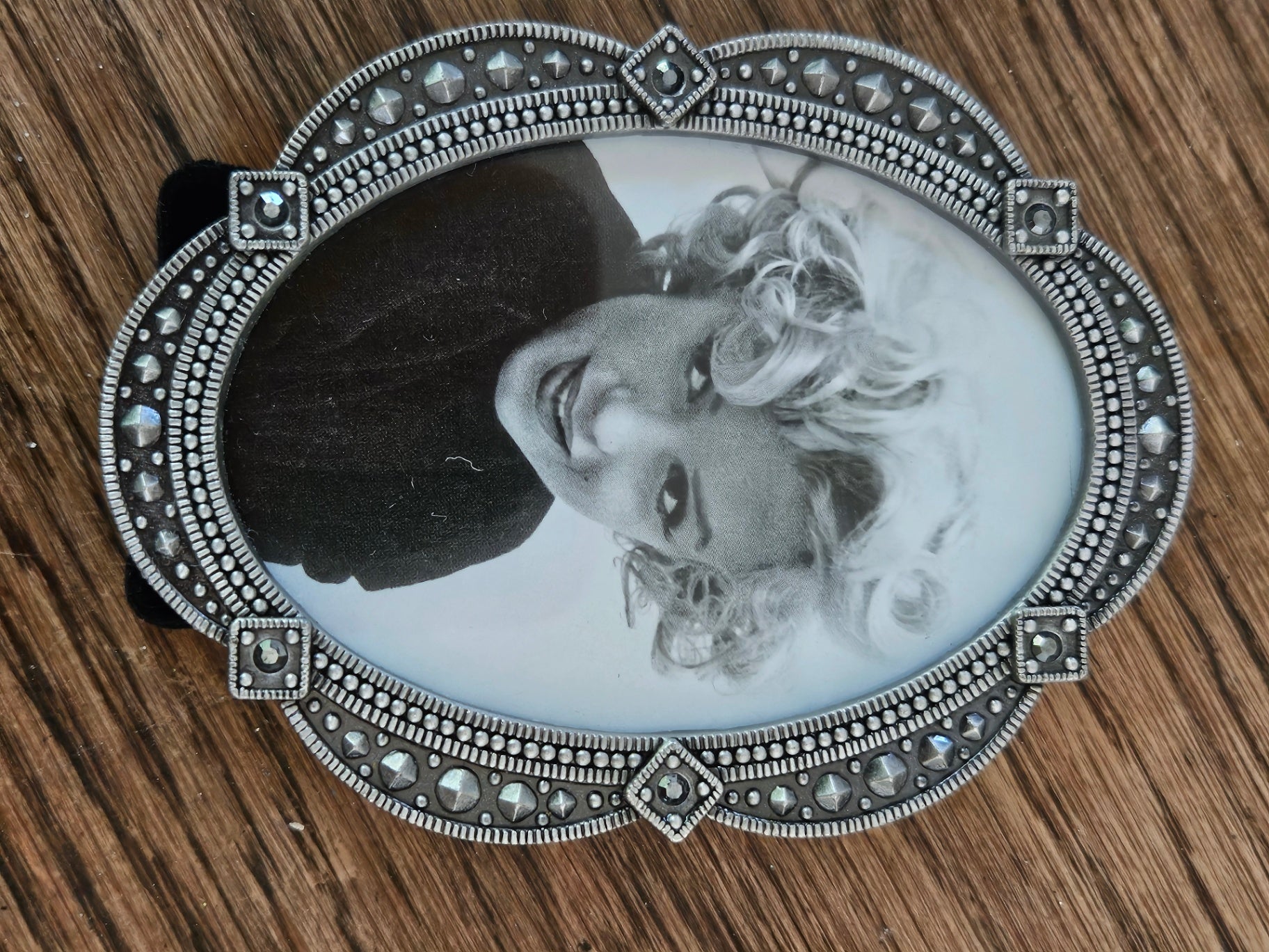 Small oval metal frame with rhinestones 4 inch tall