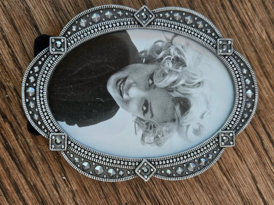 Small oval metal frame with rhinestones 4 inch tall